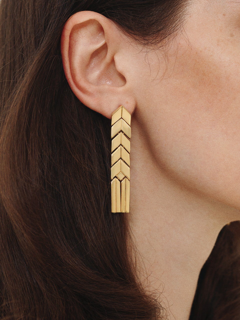Worn view with the earring length visible