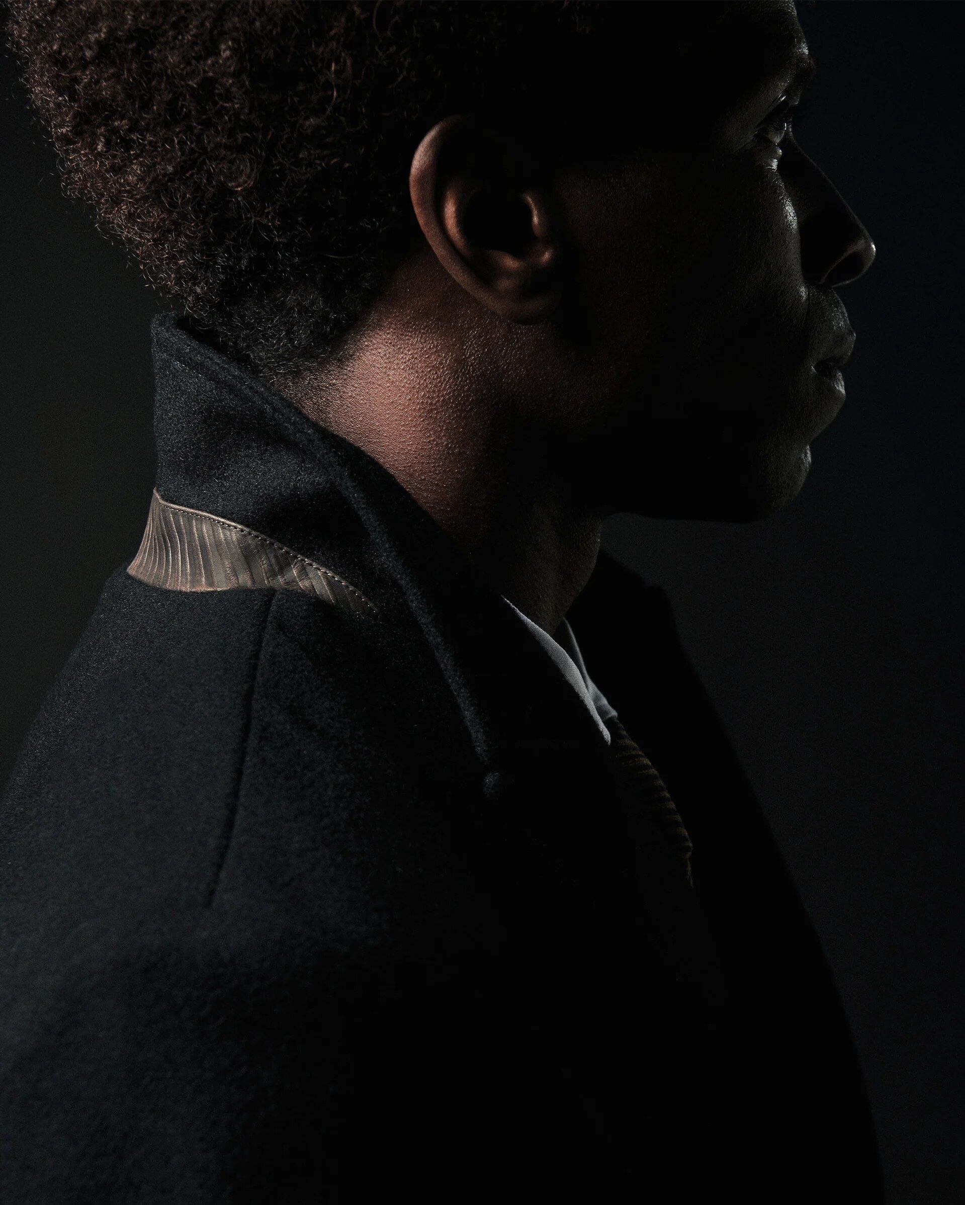 collar and shoulder profile in low light