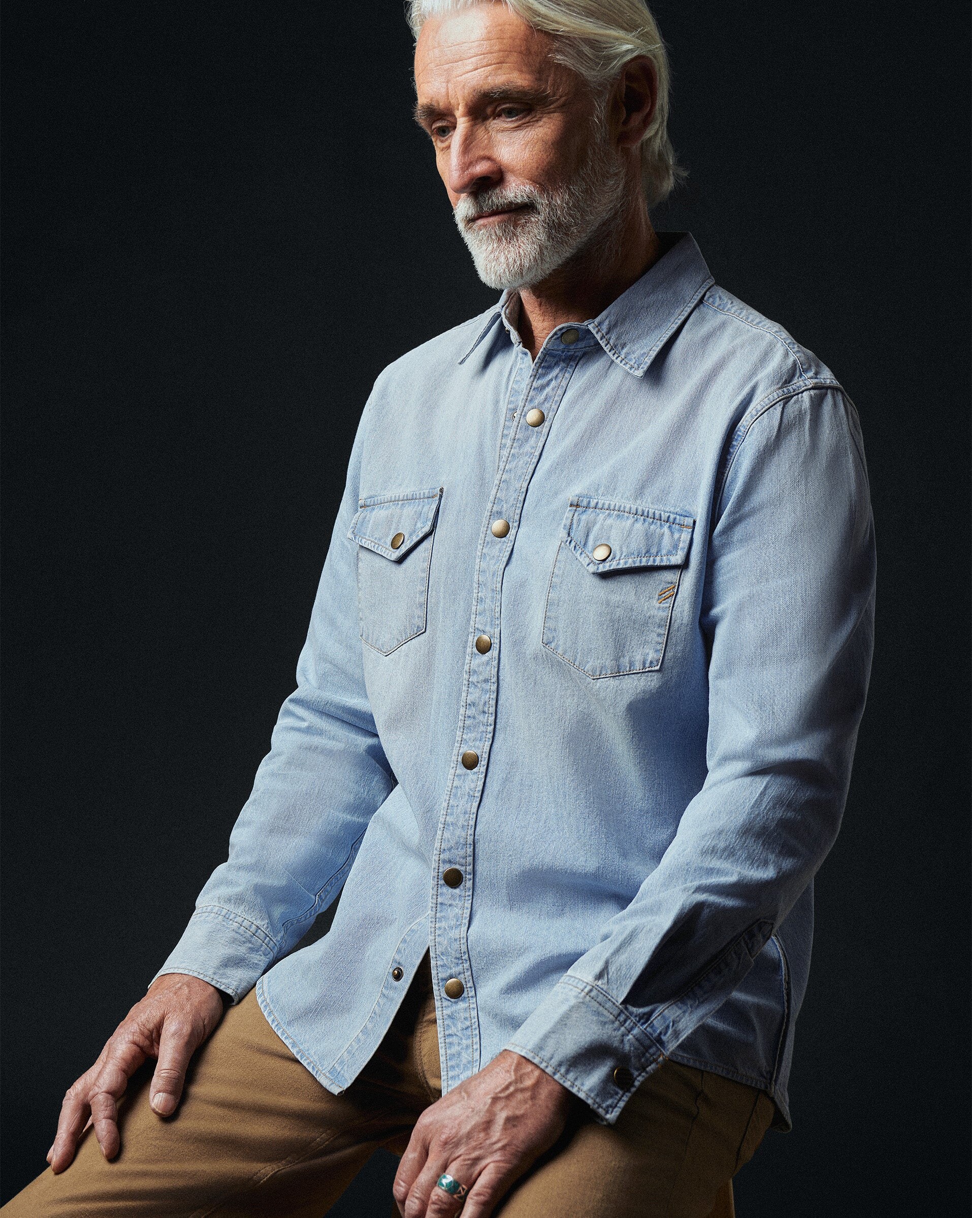 worn open-collar in the denim wash