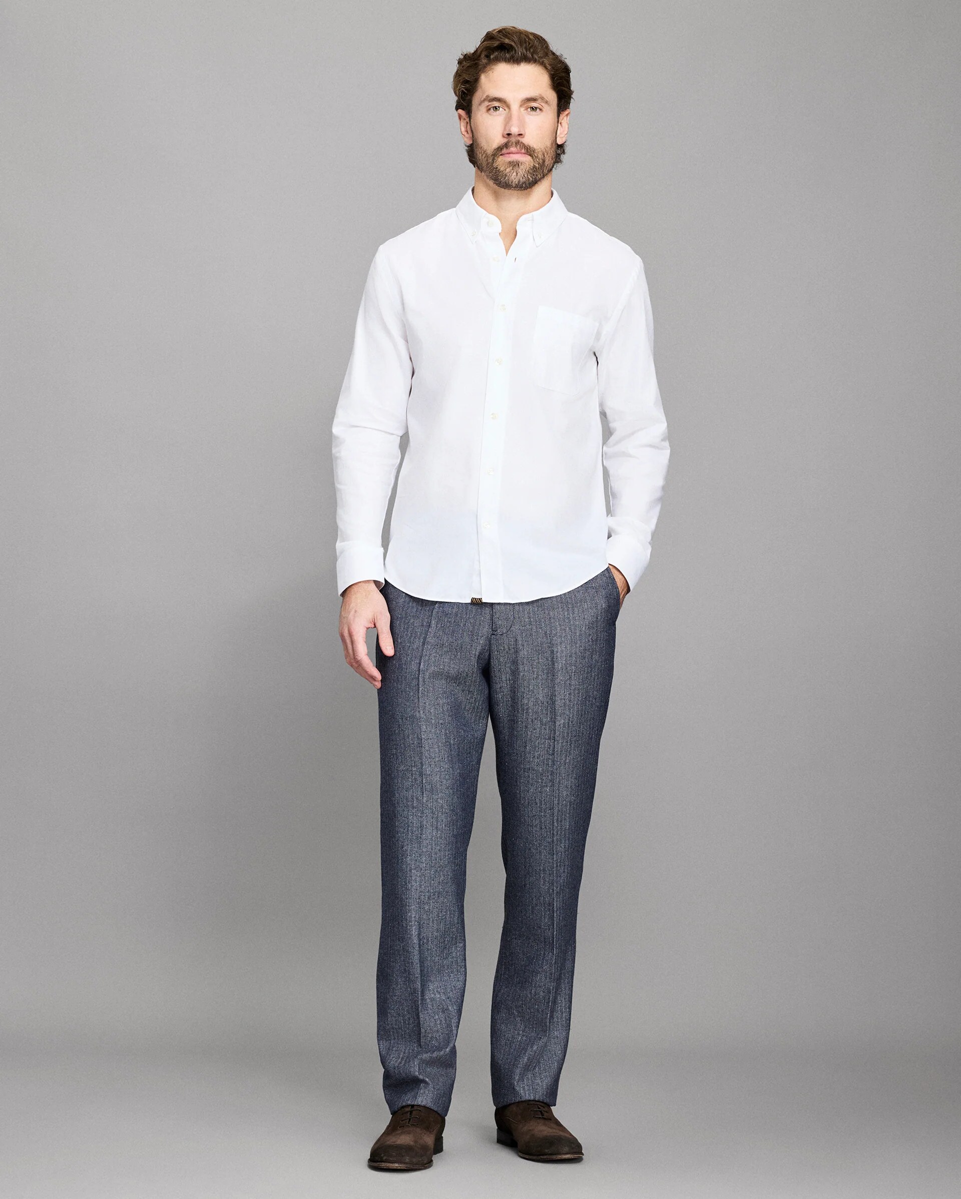 styled with grey trousers