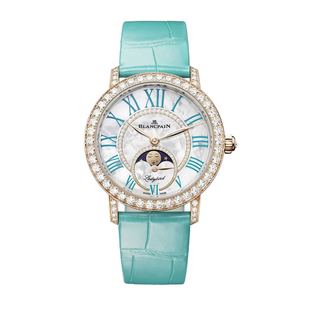 Turquoise-strapped colour variant with Roman numerals