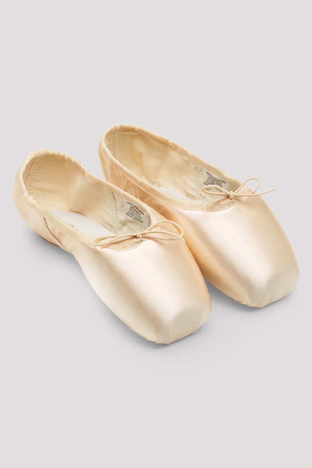 Paired satin shoes with generous platform