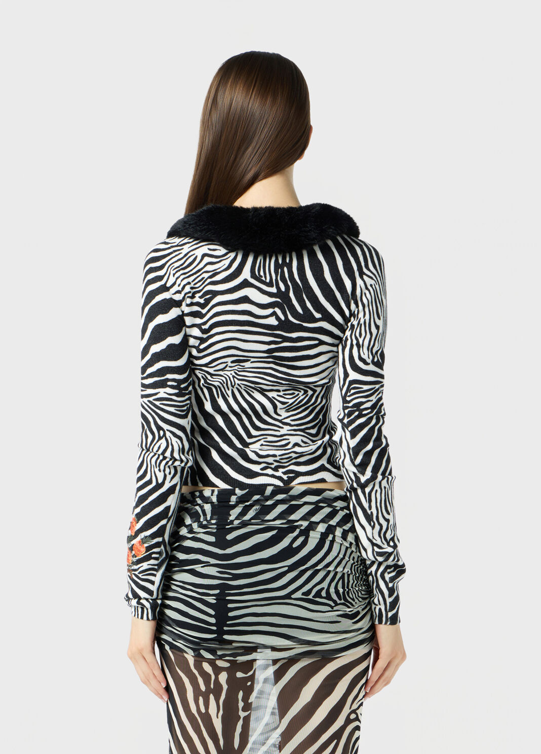 back view of the zebra-print knit