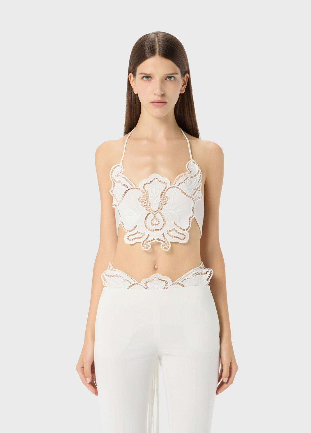 Top with butterfly embroidery