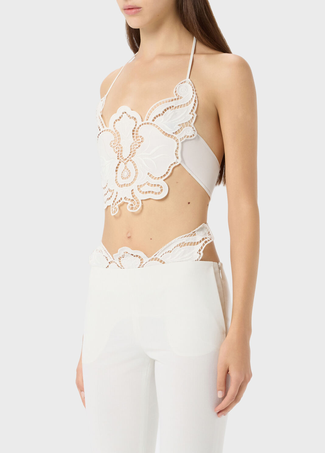 close view of the embroidered butterfly shape