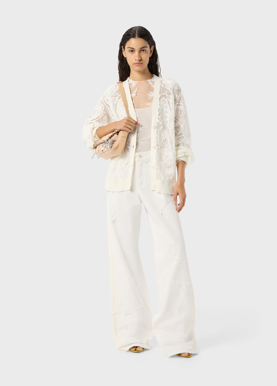 styled over white trousers