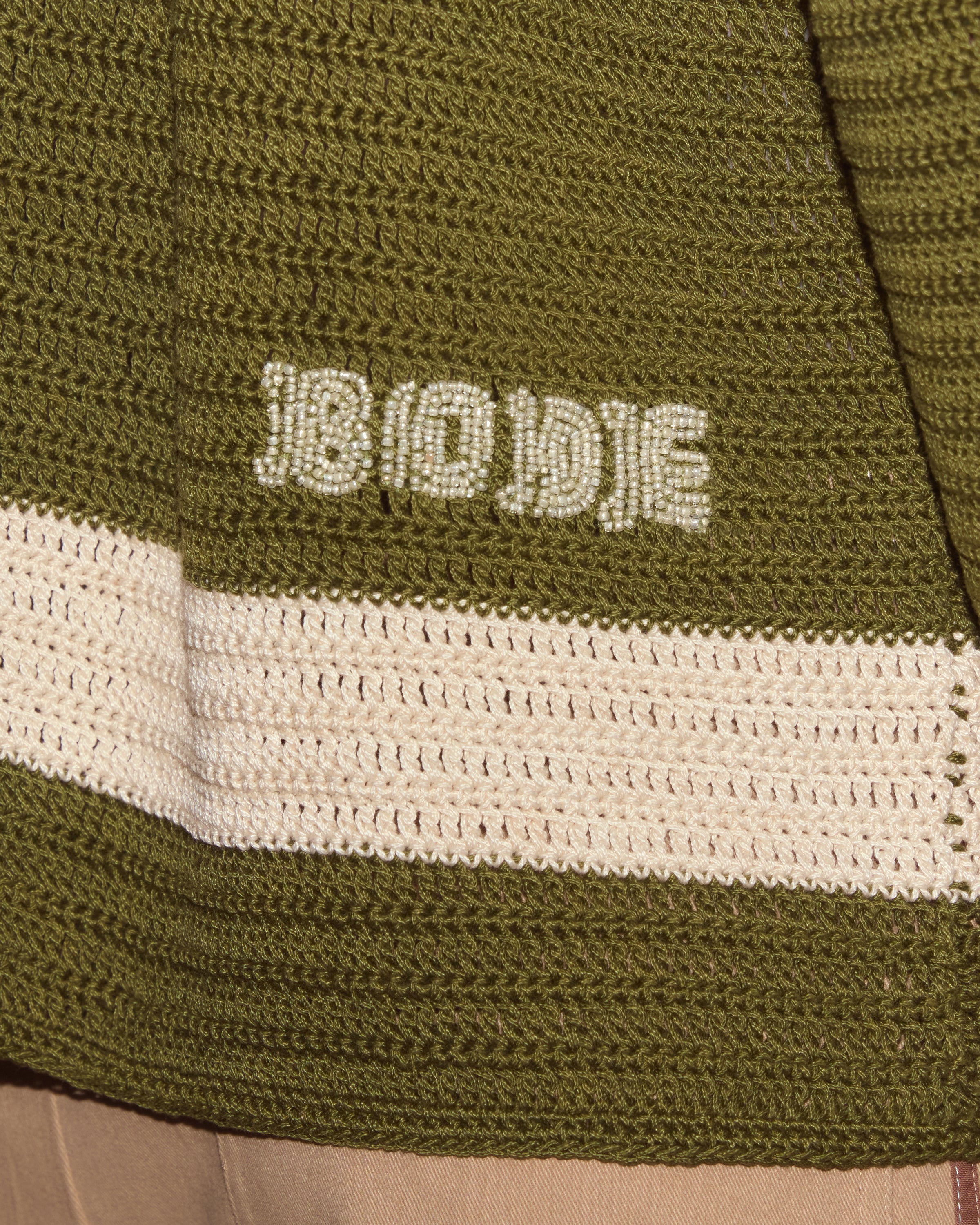 Side view of the hand-crocheted shirt