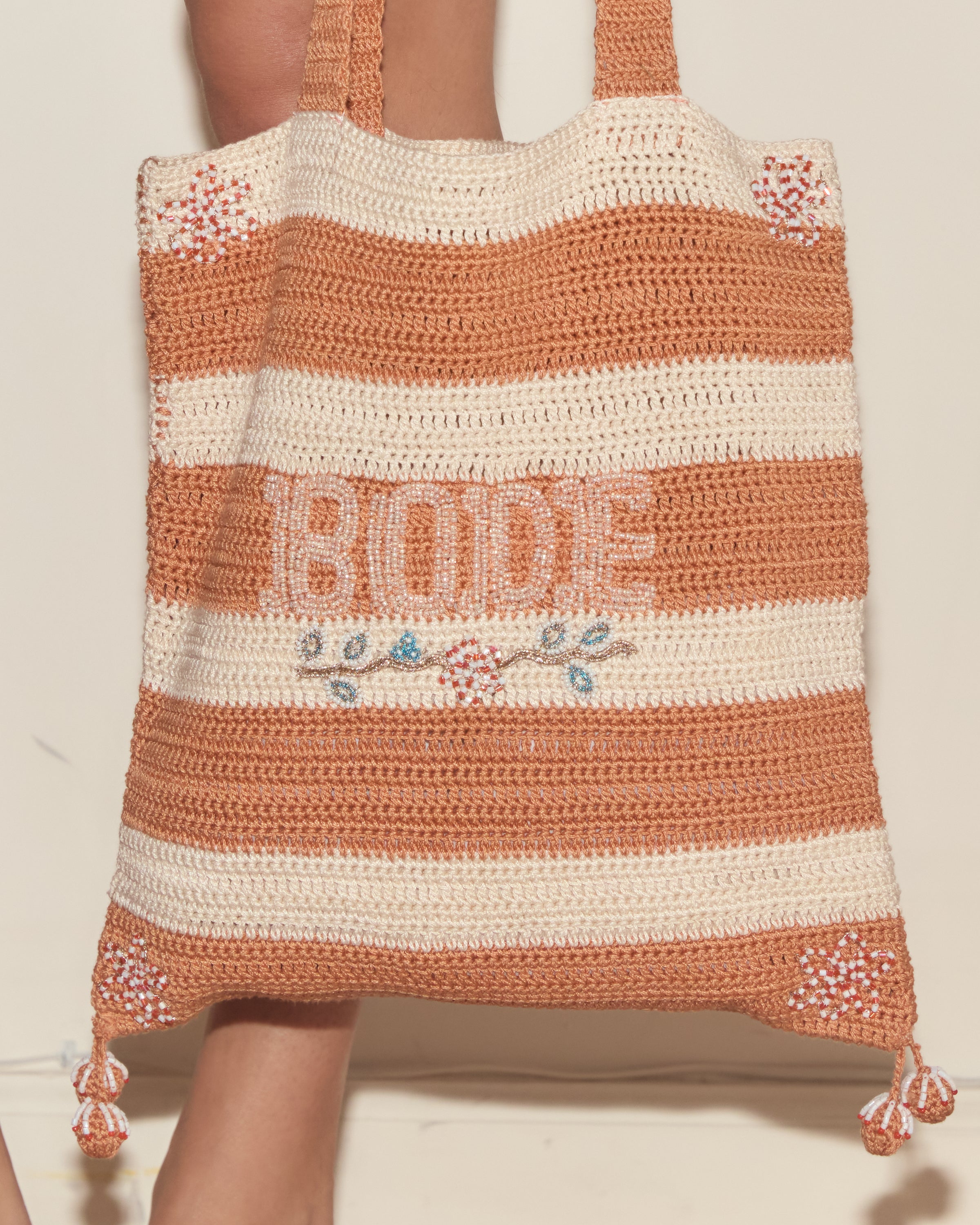 Crochet tote side view with tassels