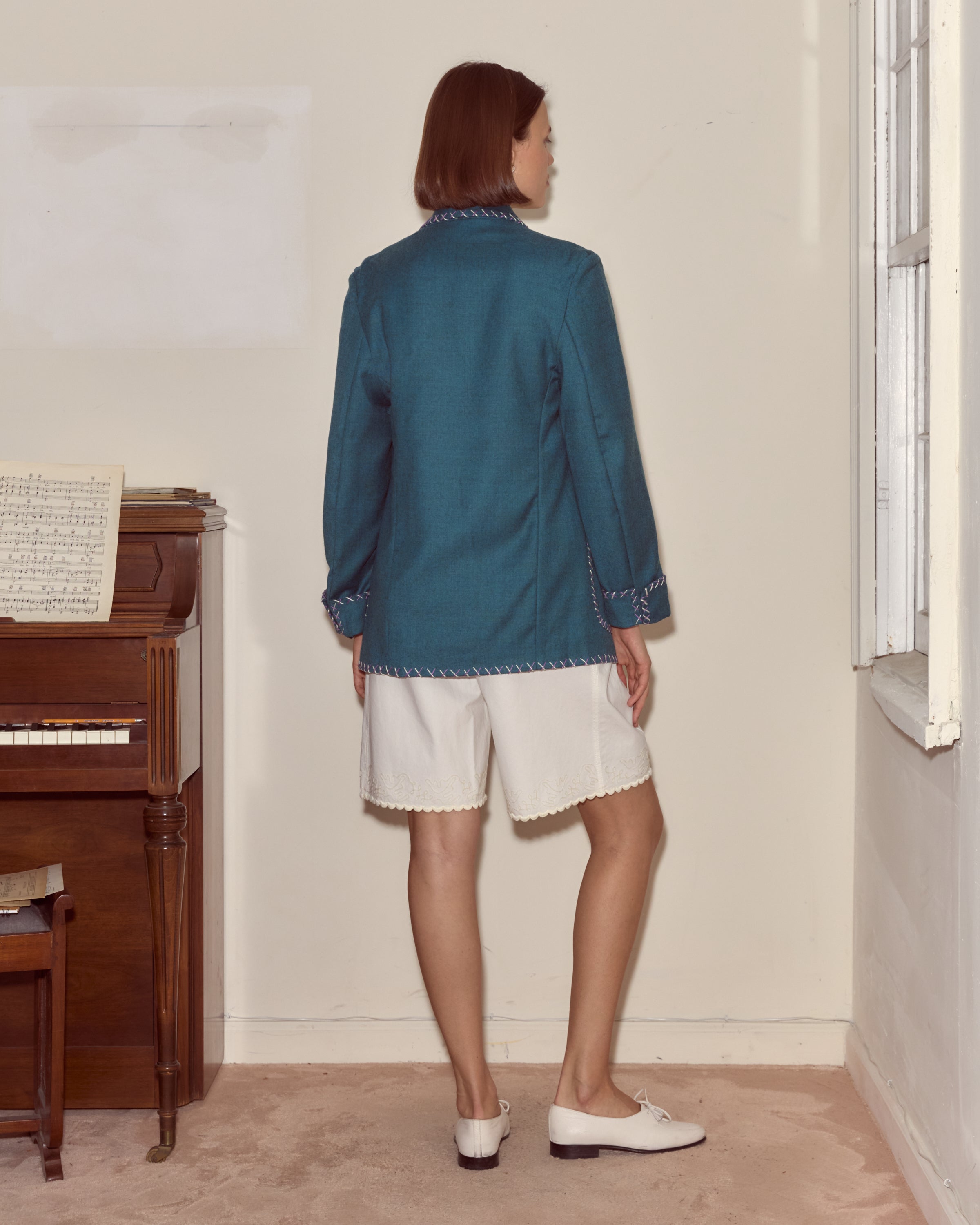 Back view of the grey-blue wool jacket