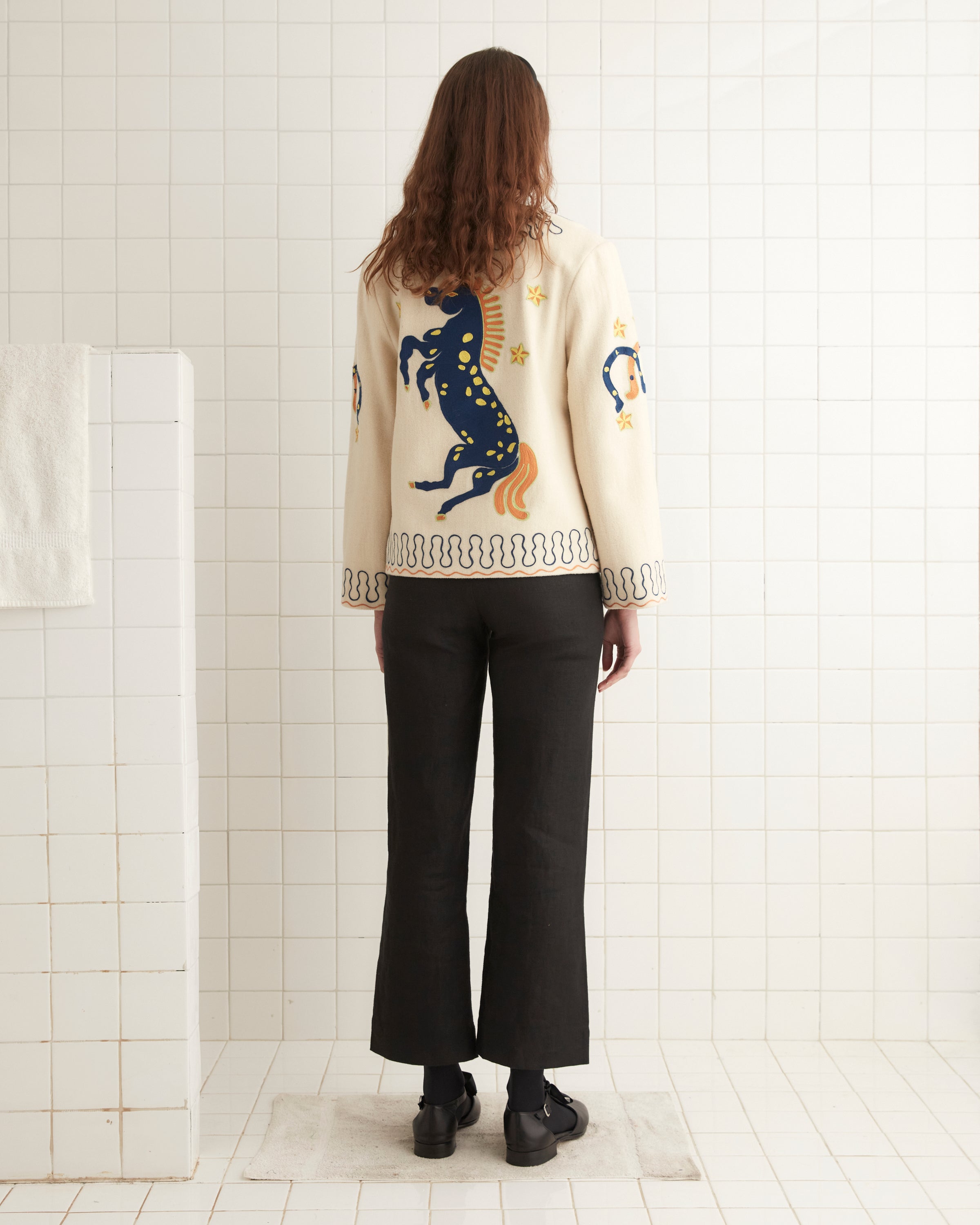 Cream wool body with cropped souvenir silhouette
