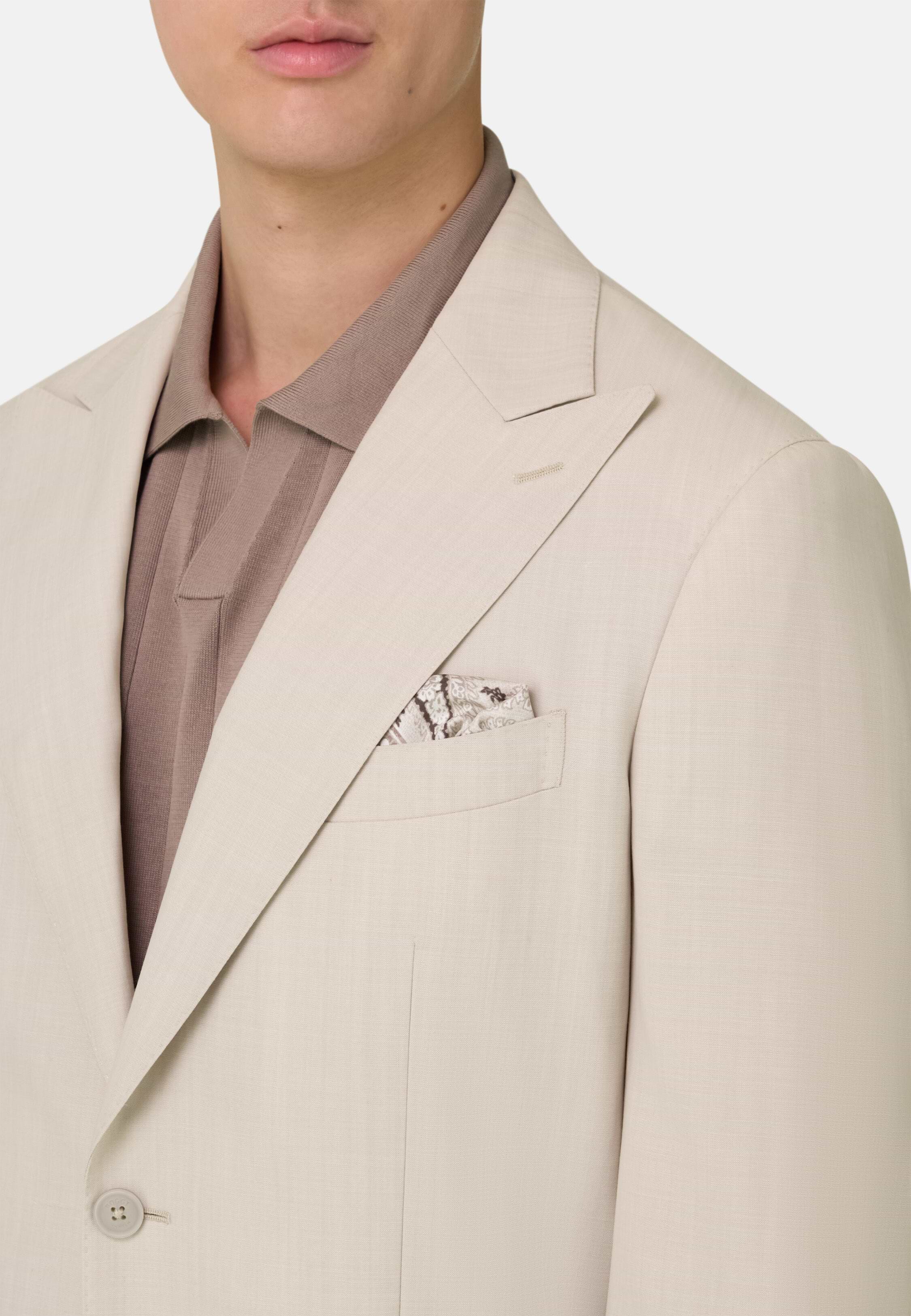 Peak lapel and pocket detail