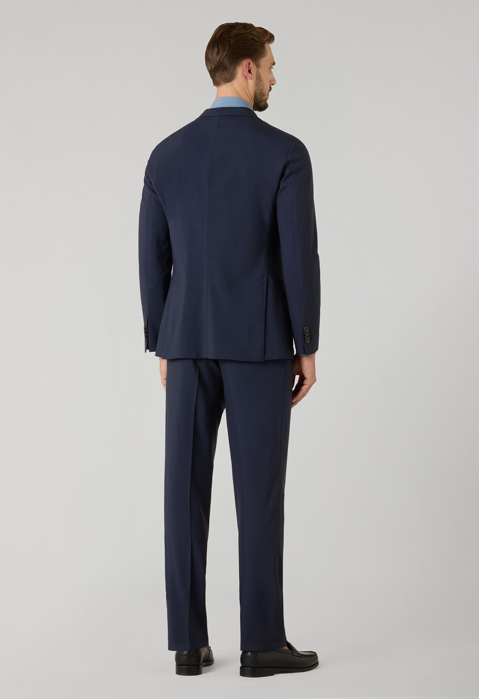 Blue High Performance Wool K-Suit, angled view