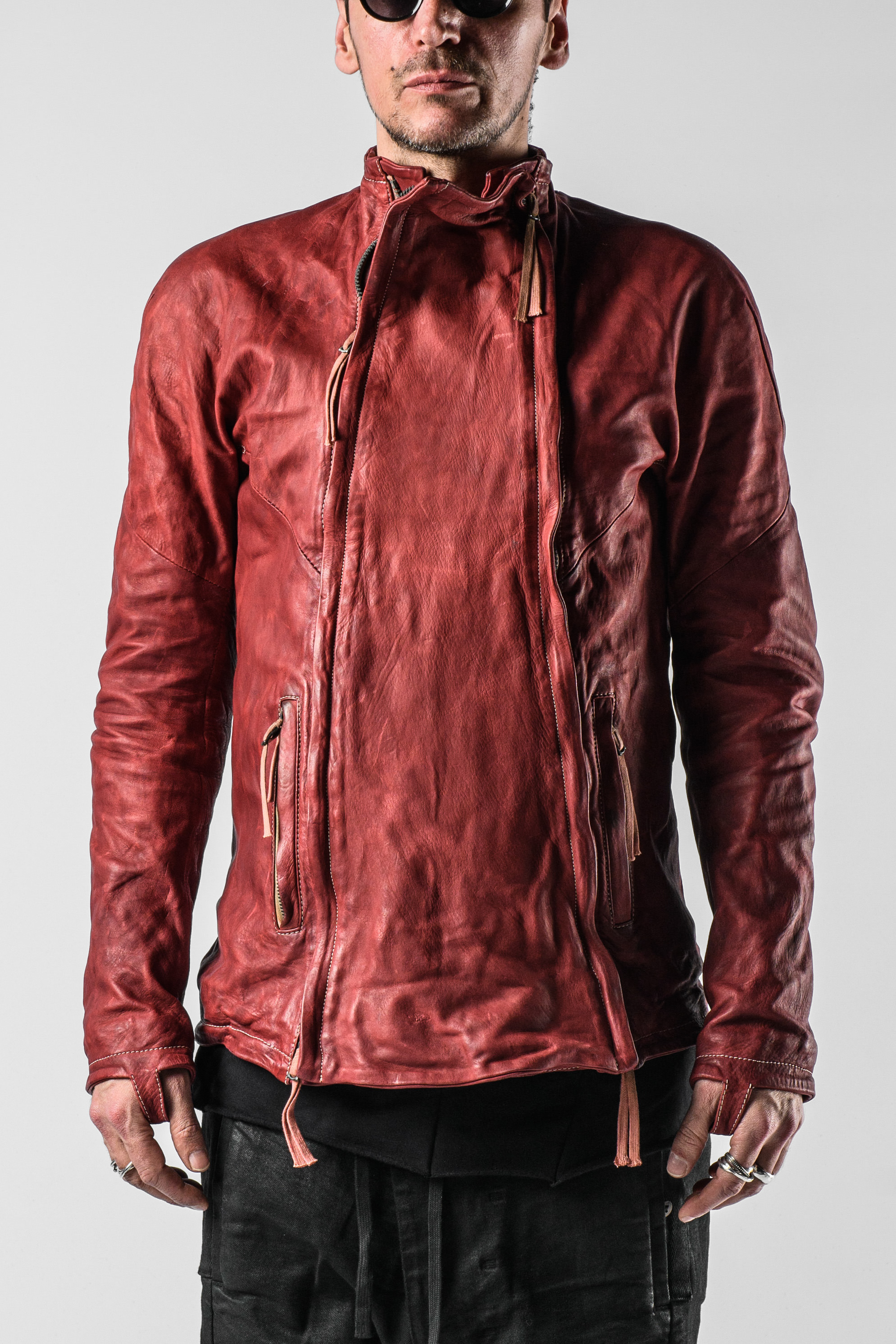 Red leather finish worn close to the body