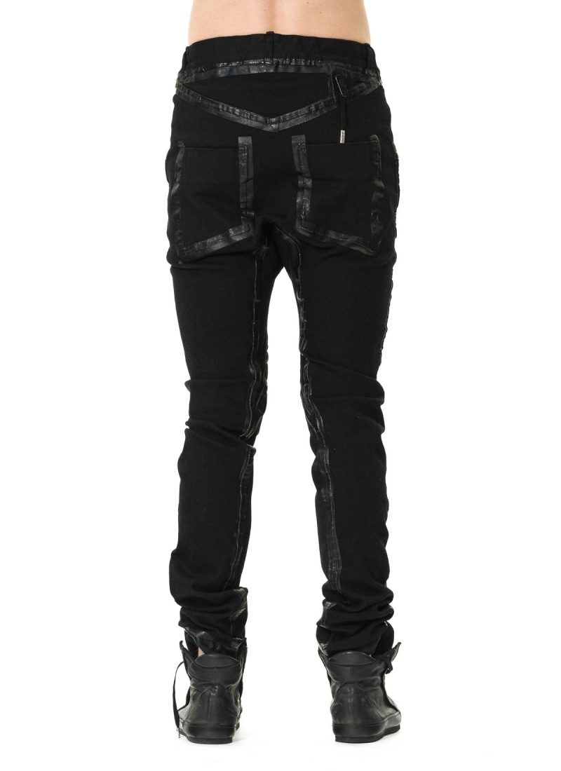 Back view with narrow leg and pocket placement