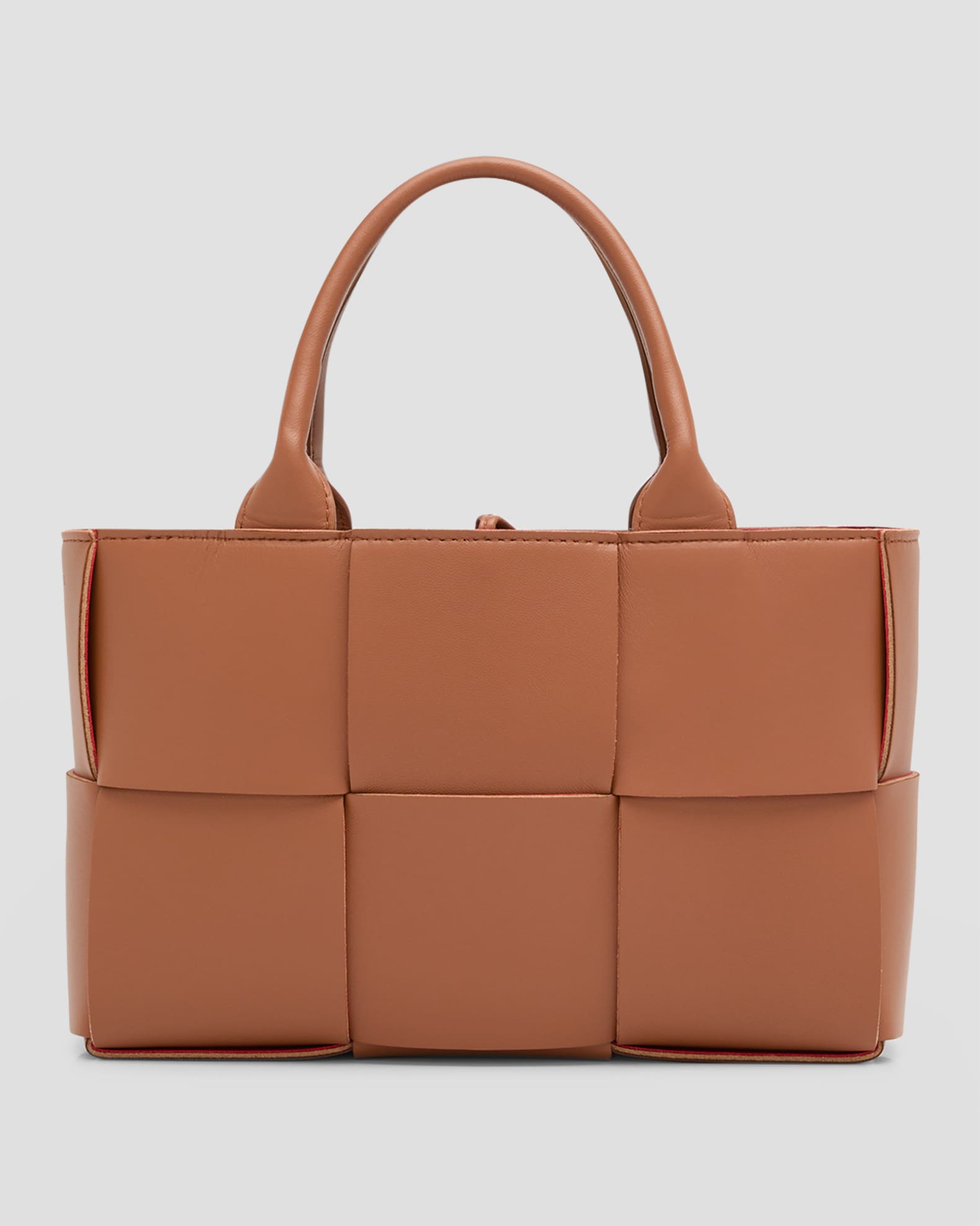 Mini Arco in tan calfskin — the compact woven proportion