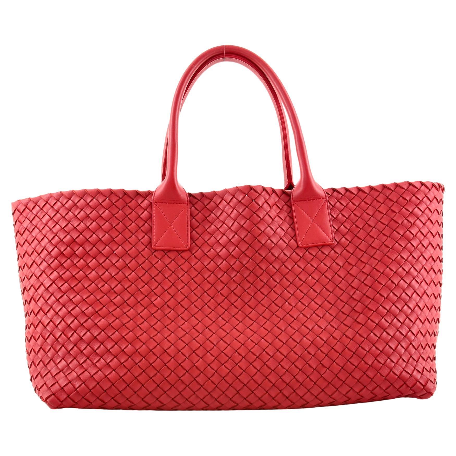 Coral red — the trapezoidal shopper silhouette