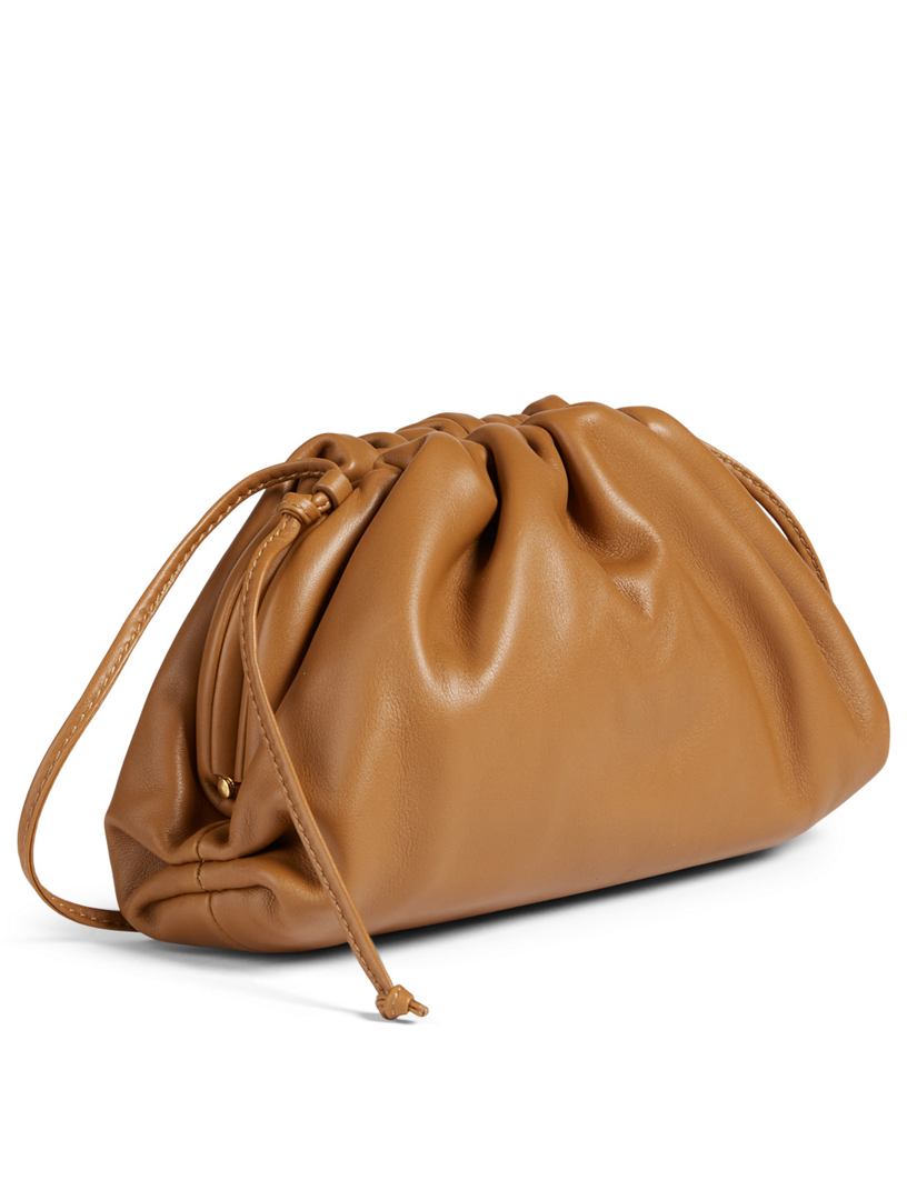 Caramel smooth leather — side angle with the knotted leather strap