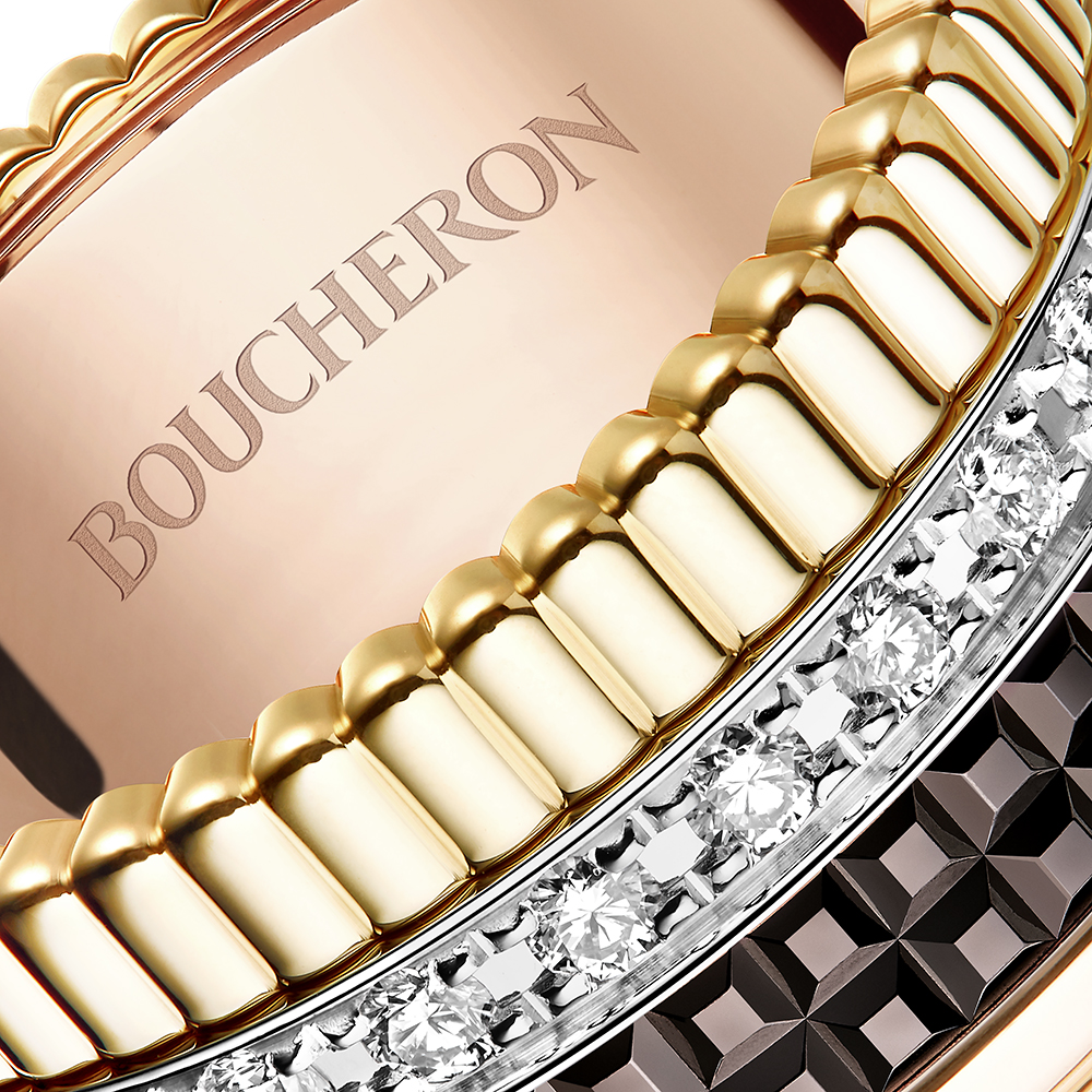 Close detail of pavé diamonds, Clou de Paris and gadrooned bands