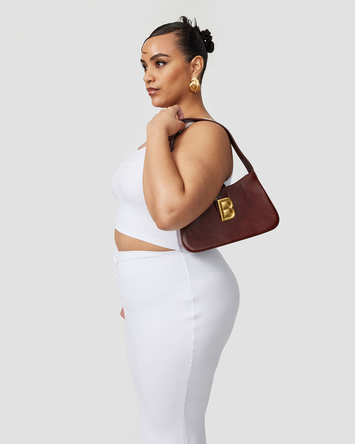 Daphne Bag — side angle and handle profile