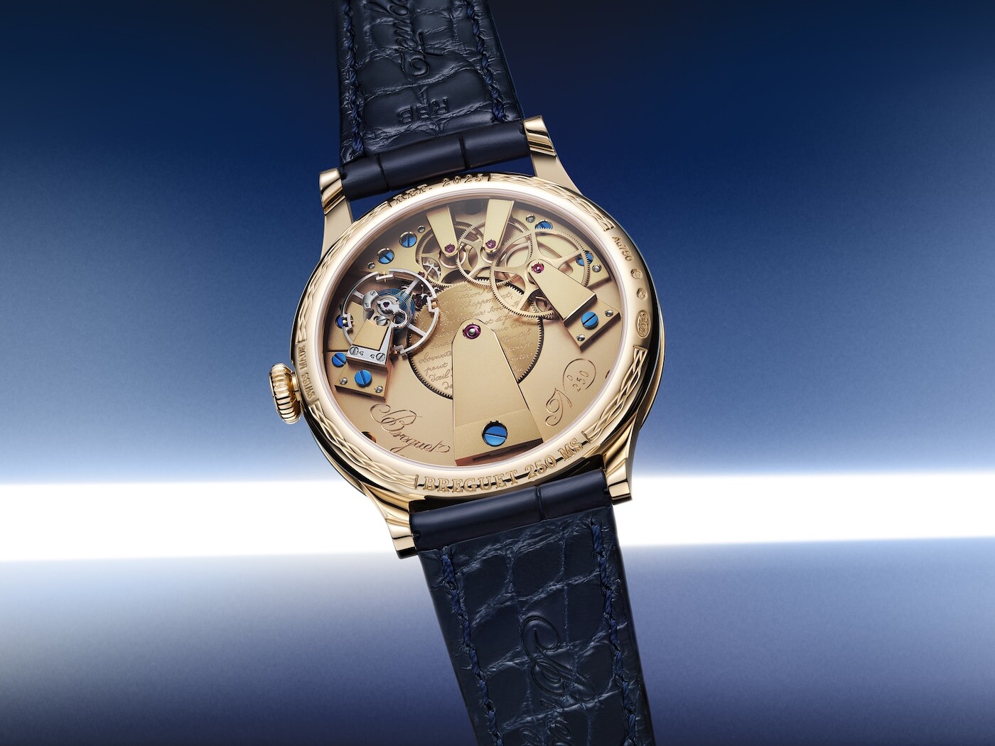 Oblique view of the polished enamel dial and curved gold case