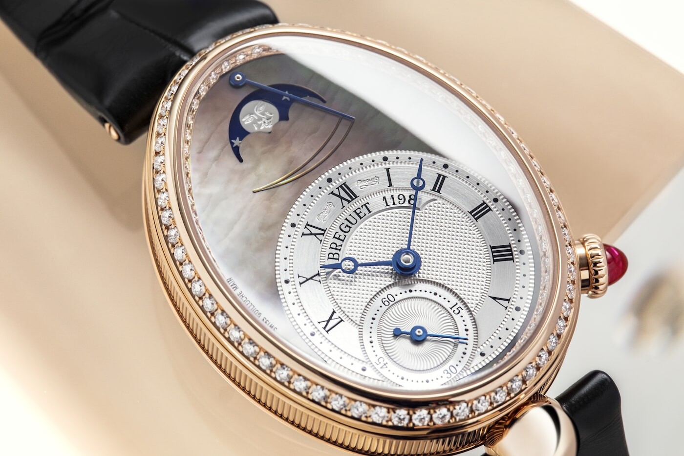 Reine de Naples Phase de Lune with gem-set bezel
