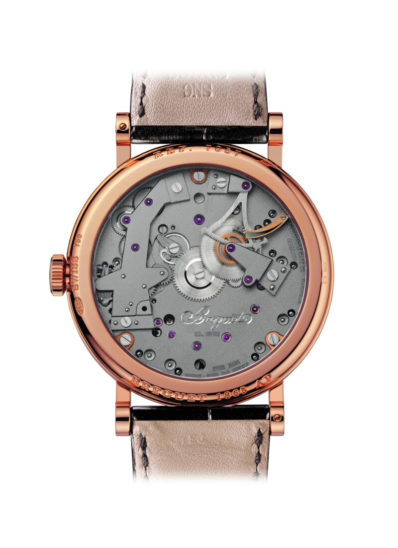 Rose-gold Tradition 7057 with visible bridges and gear train