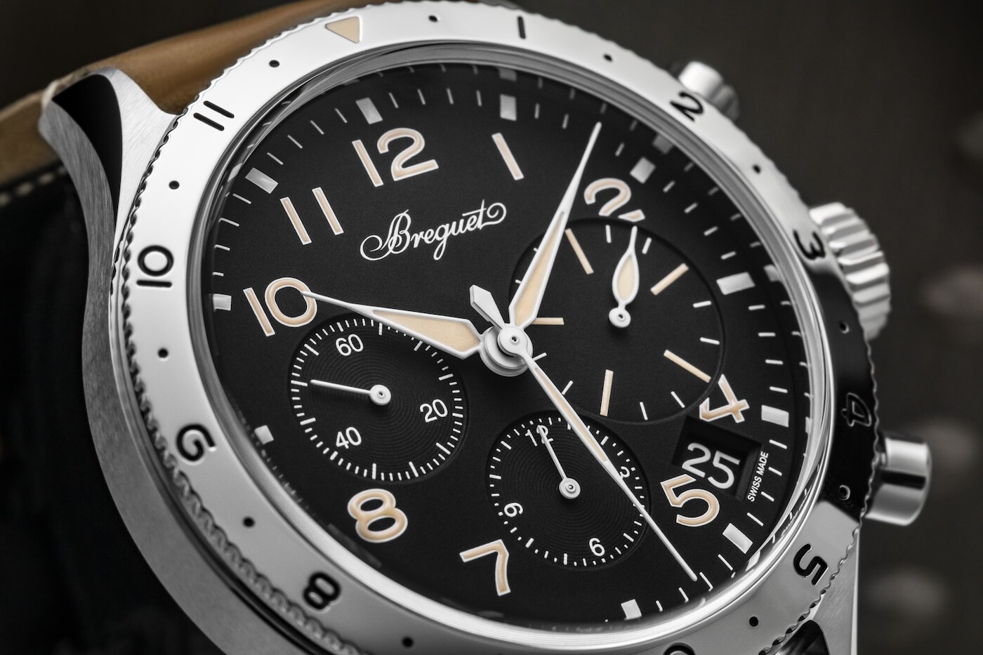 Close dial view with Arabic numerals and three counters