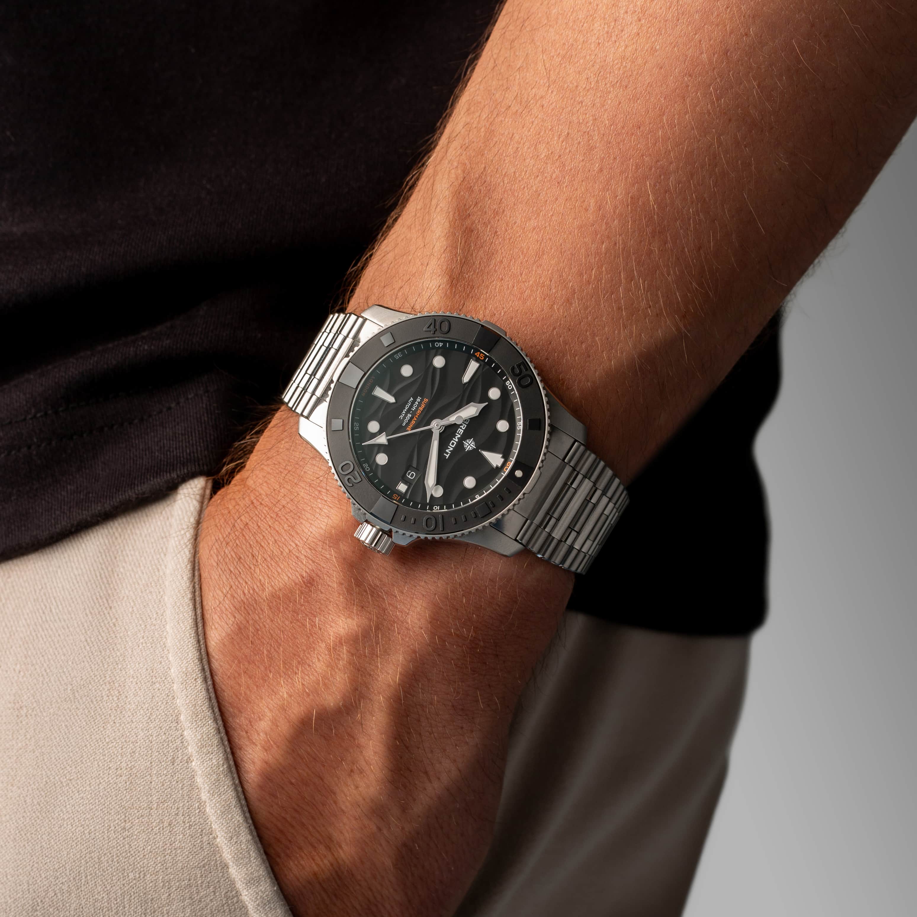 Wrist view showing the 43mm case and bracelet fit
