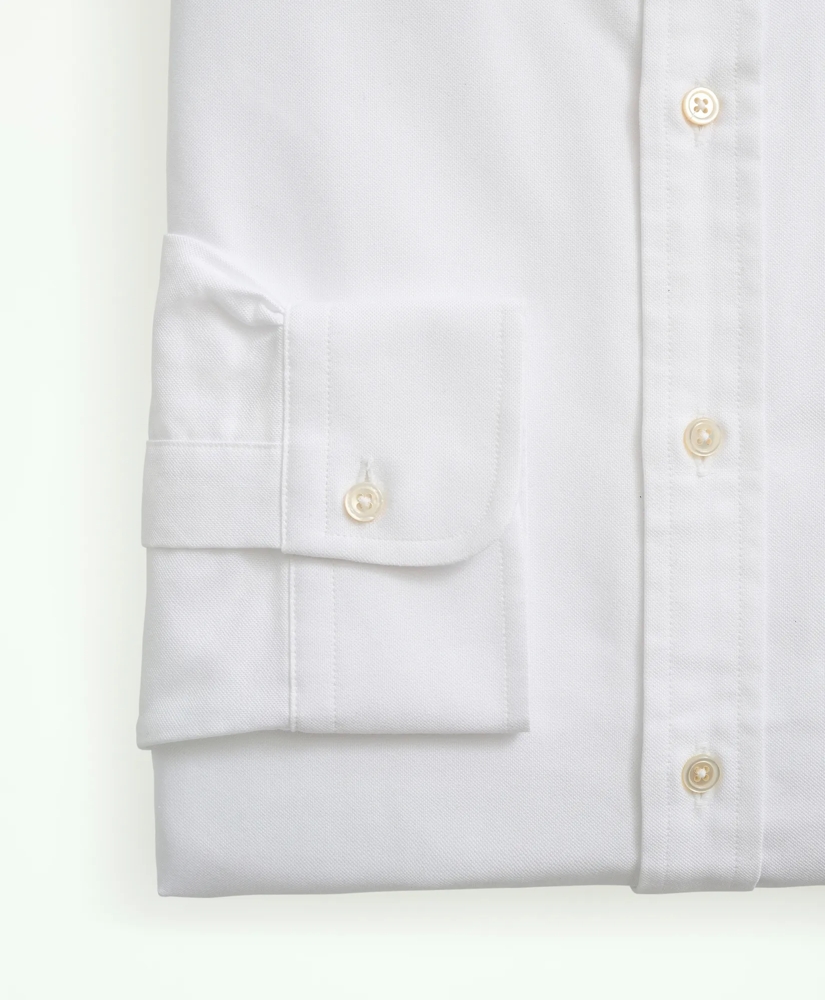 Cuff, placket and button detail