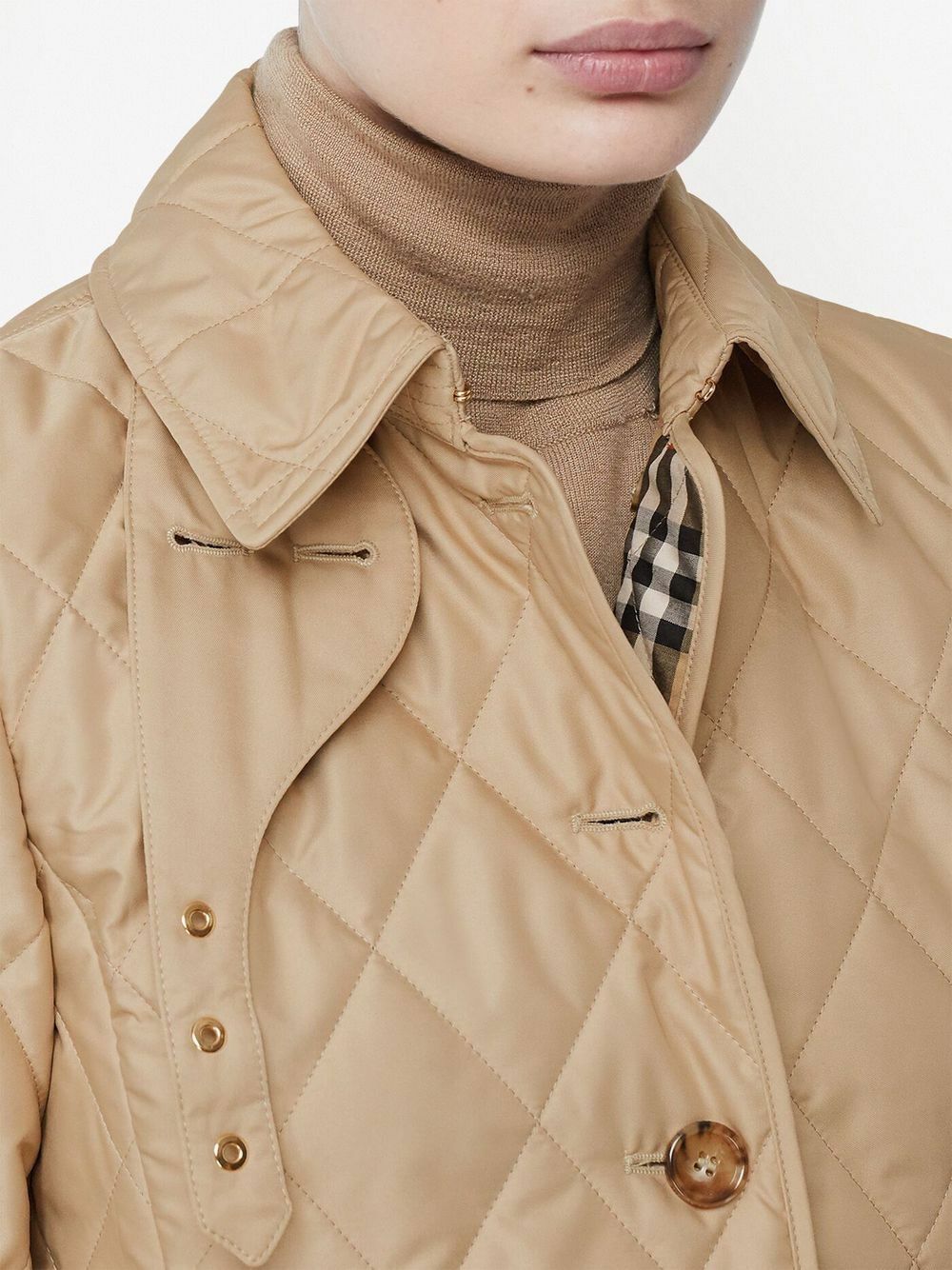 Collar detail — the Vintage Check lining and press-stud placket