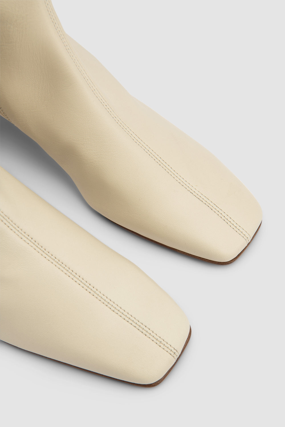 official alternate angle — Edie Off White Leather Knee-High Boot