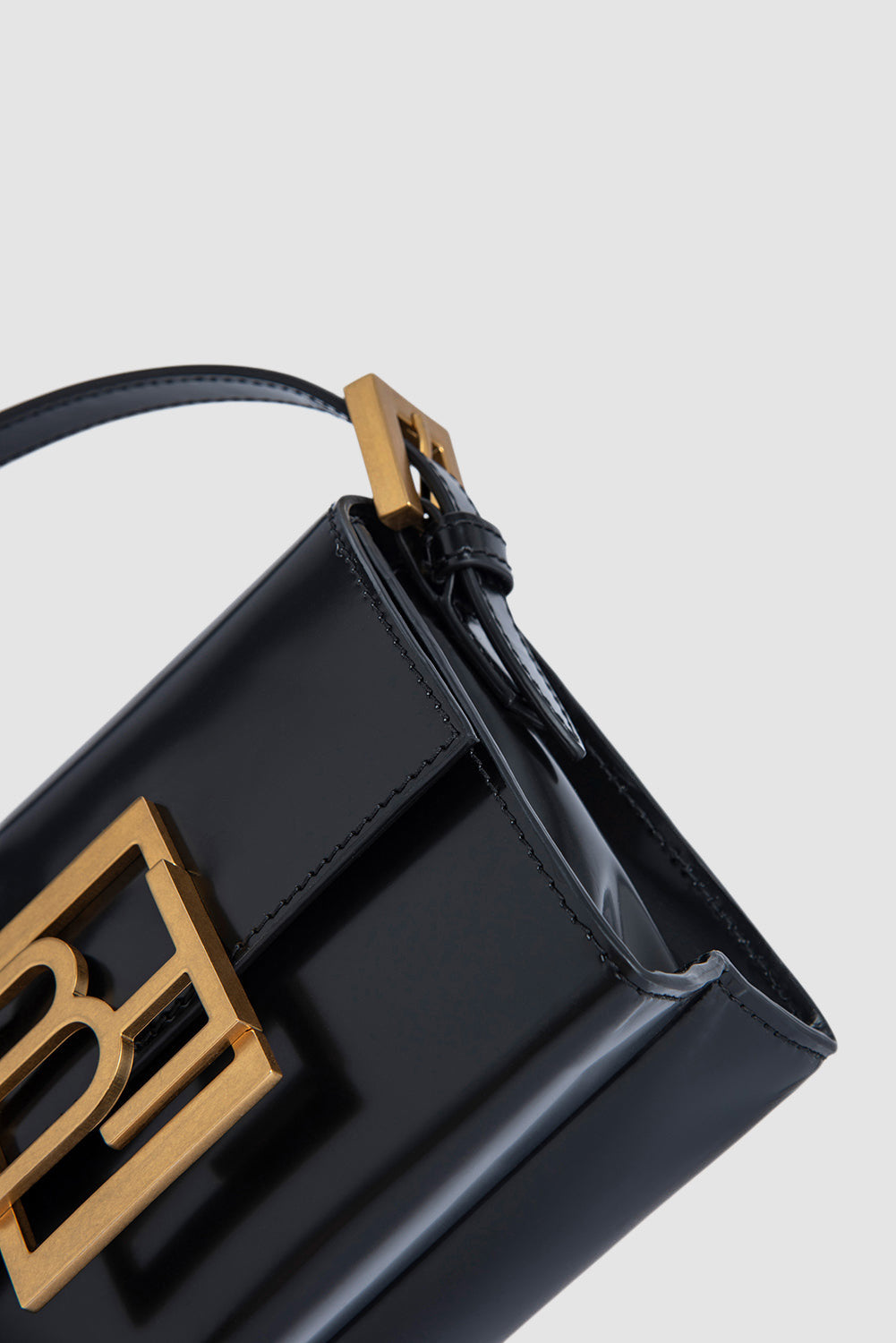 official alternate angle — Fran Black Semi Patent Leather Top-Handle Bag