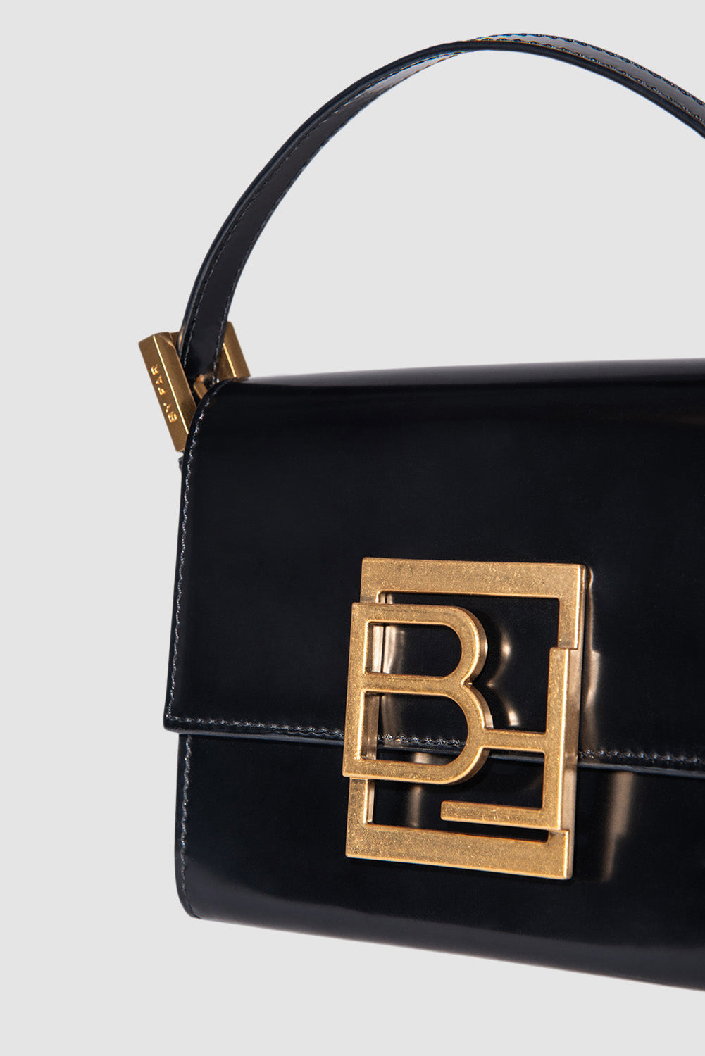 official alternate angle — Fran Black Semi Patent Leather Top-Handle Bag