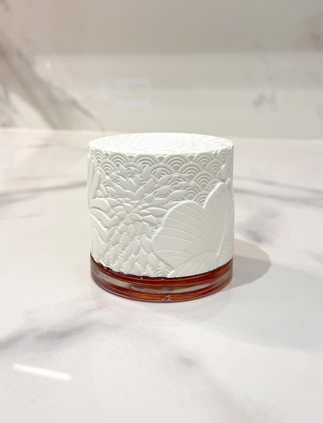 textured white cap and bottle