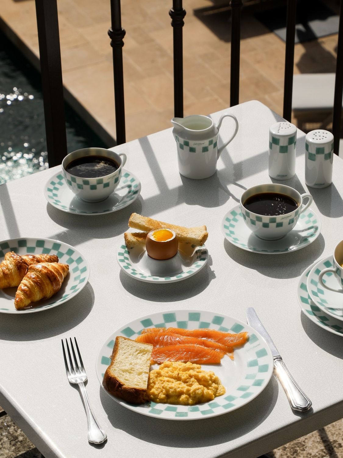 Cup and saucer on table