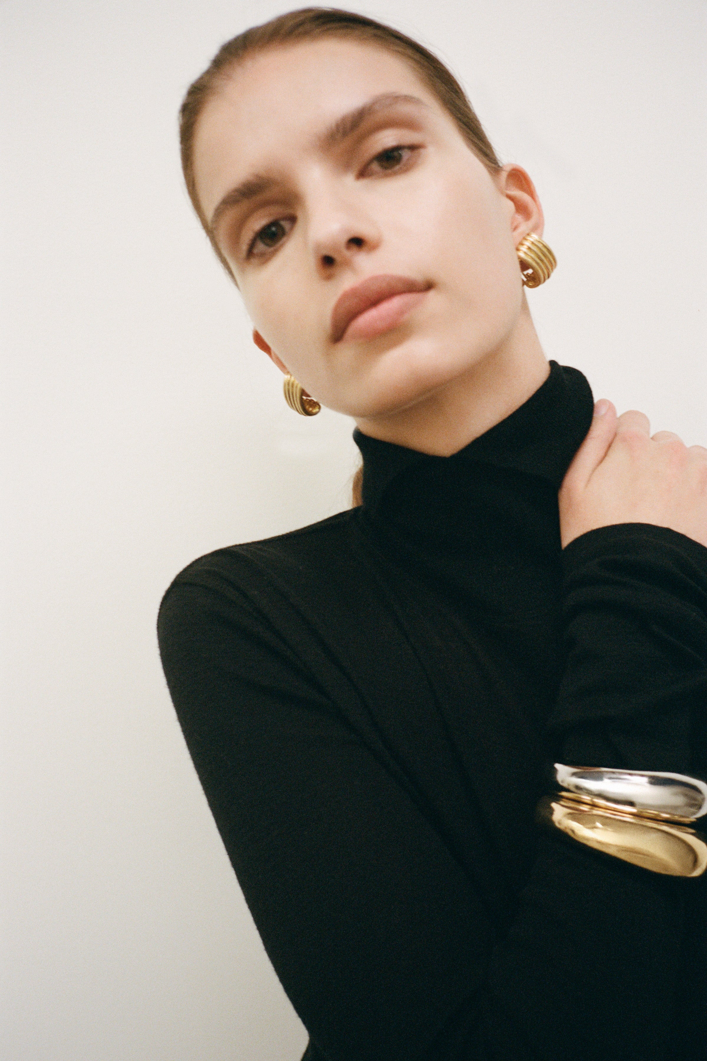 Worn with high-neck knit