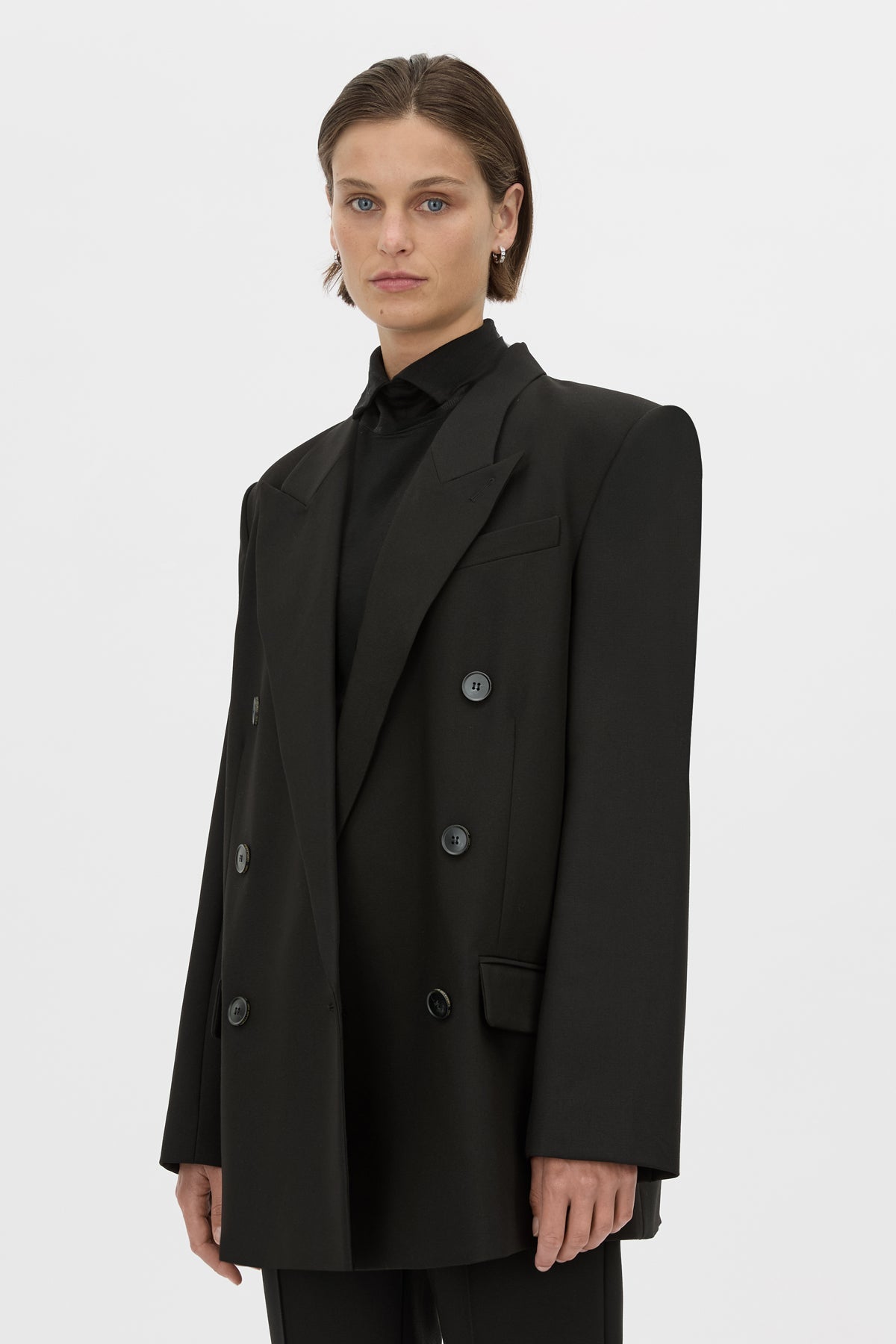 Styled with wide-leg trousers