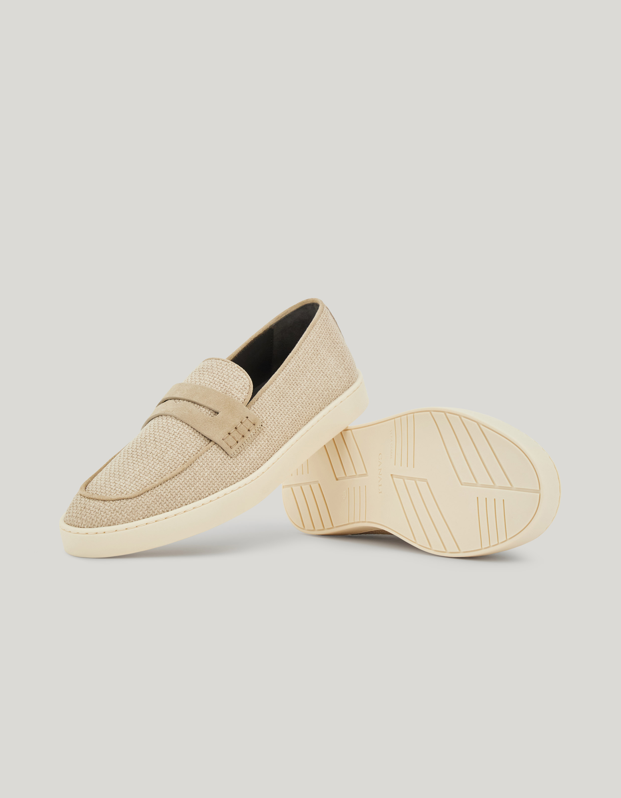 Side view of the loafer and exposed stitching