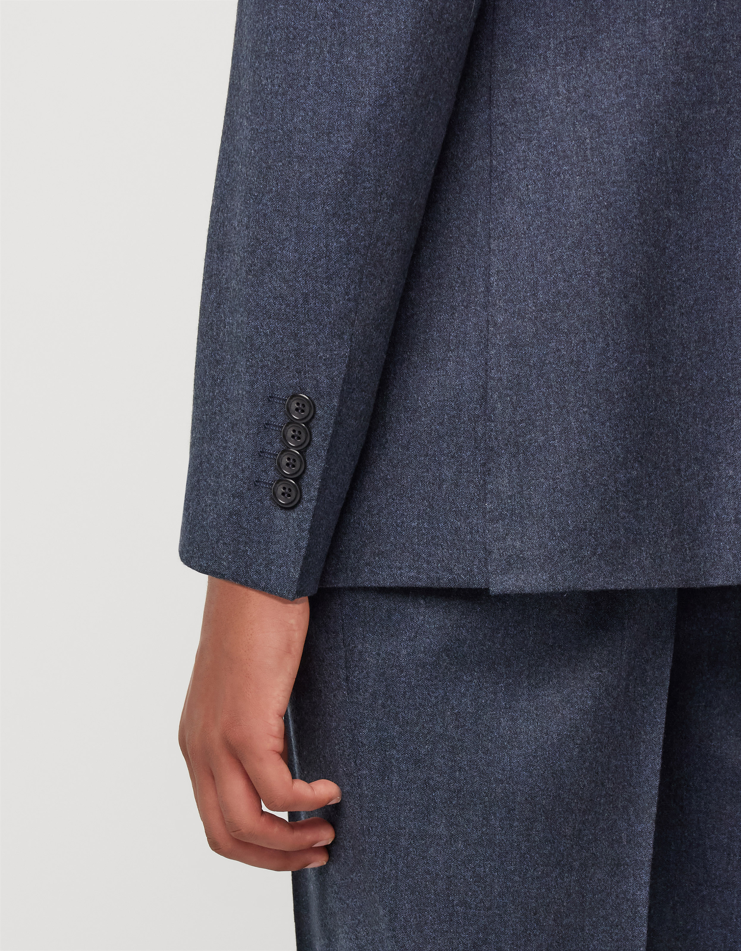 Close view of the trouser and jacket proportion