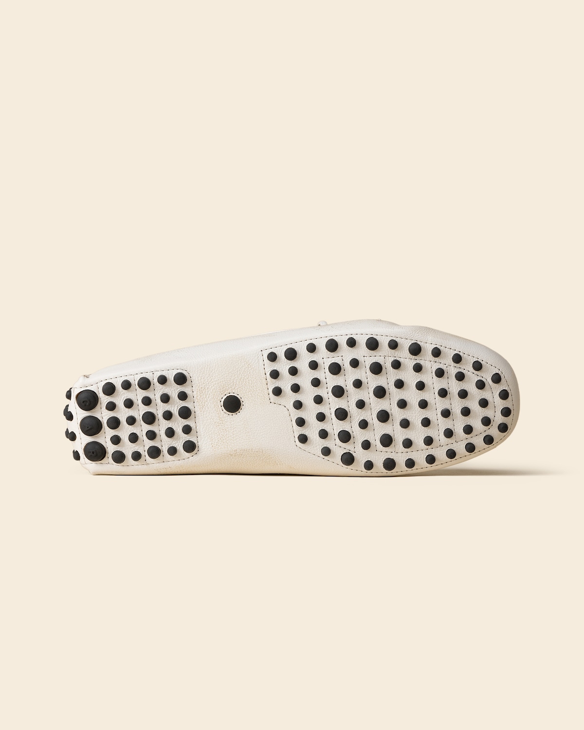 Underside with rubber nubs embedded into the sole