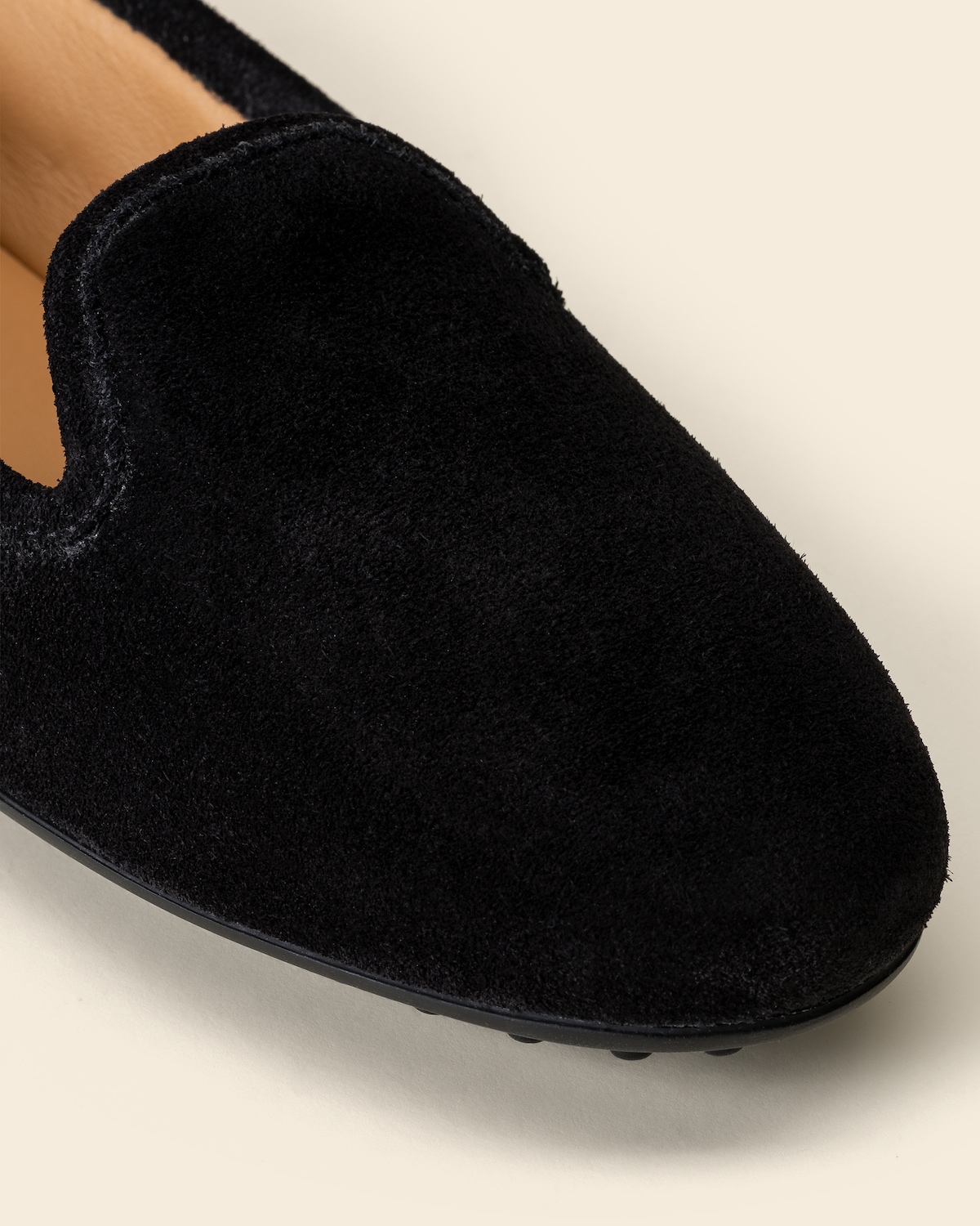Closeup of the tapered suede vamp