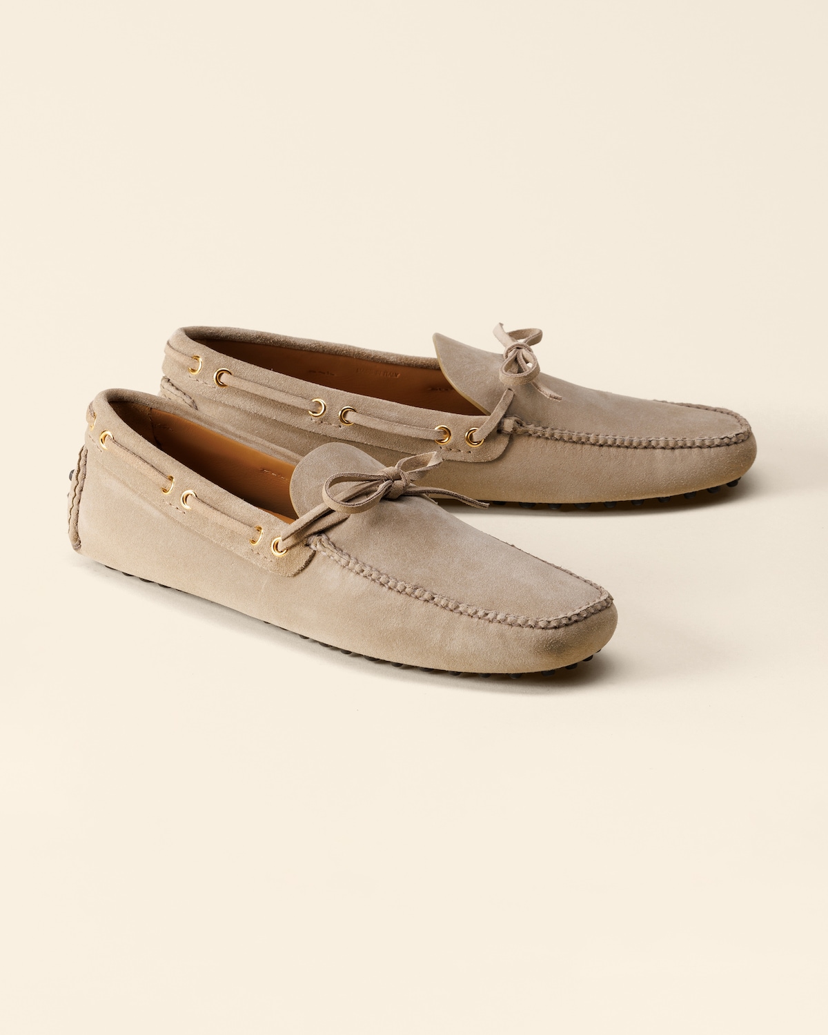 Three-quarter view of the soft suede upper