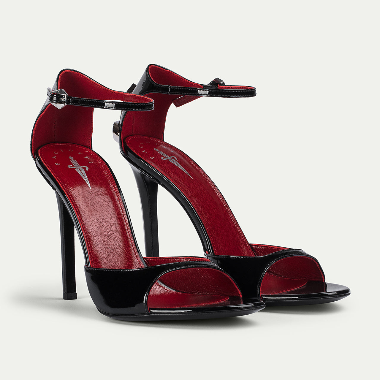 Ankle-strap profile and blade-shaped heel