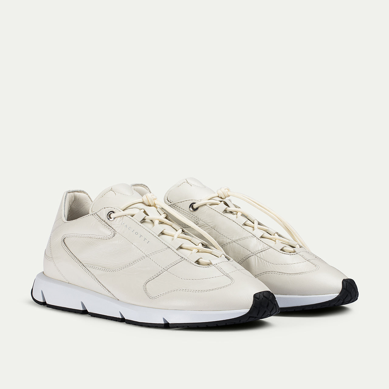 Geometric stitched panels and rope laces