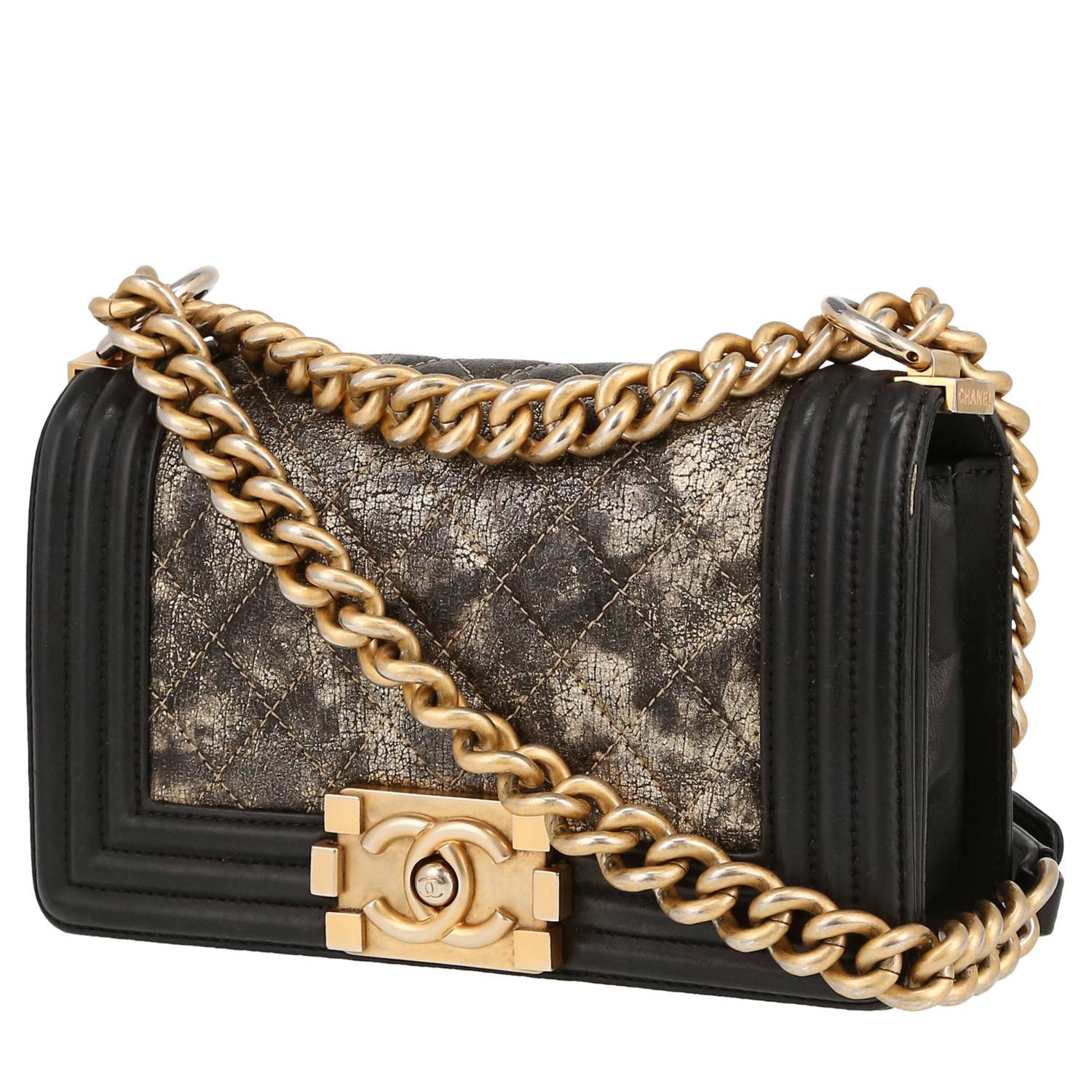 Metallic edition, three-quarter view showing the chunky chain