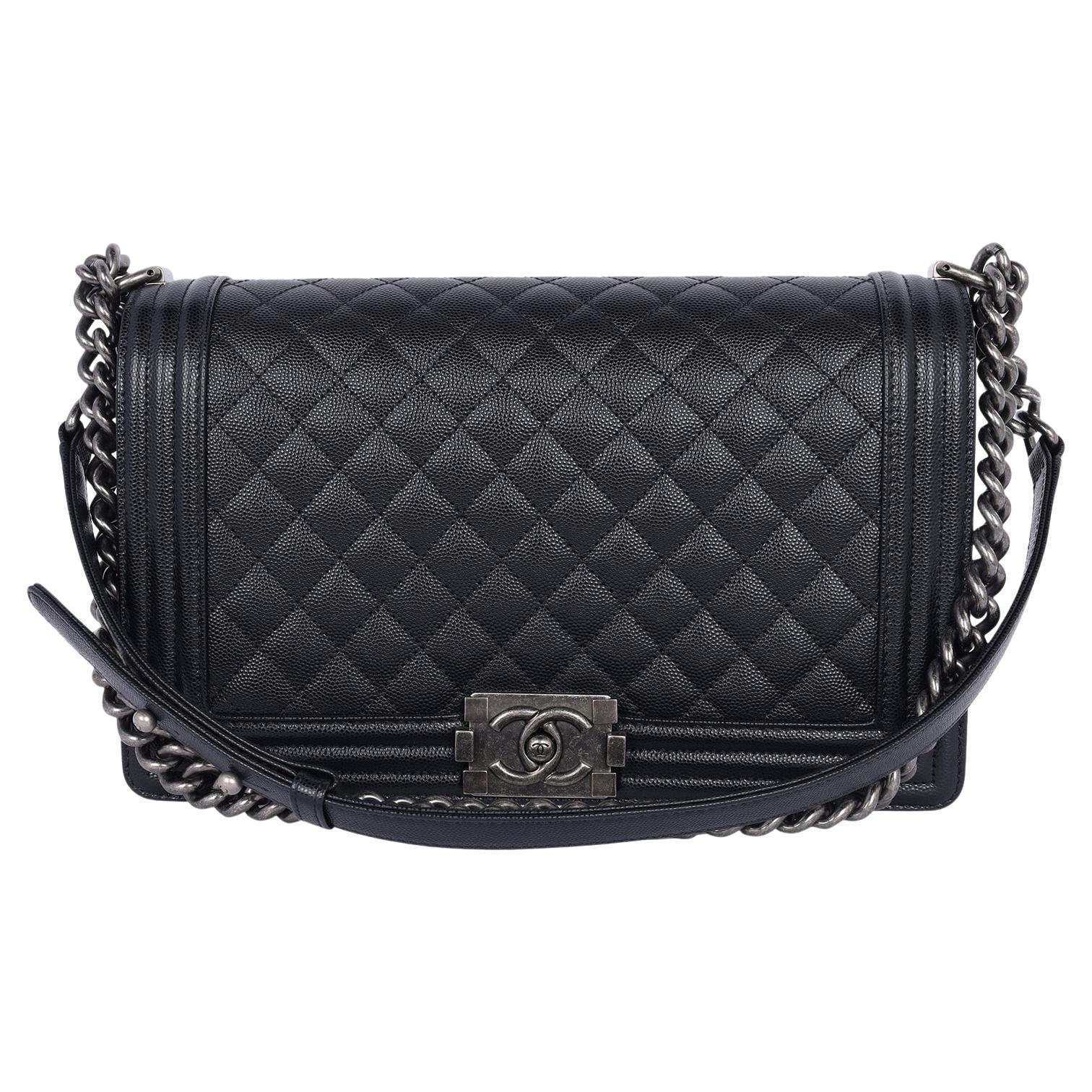 Caviar with ruthenium hardware — the raised leather frame