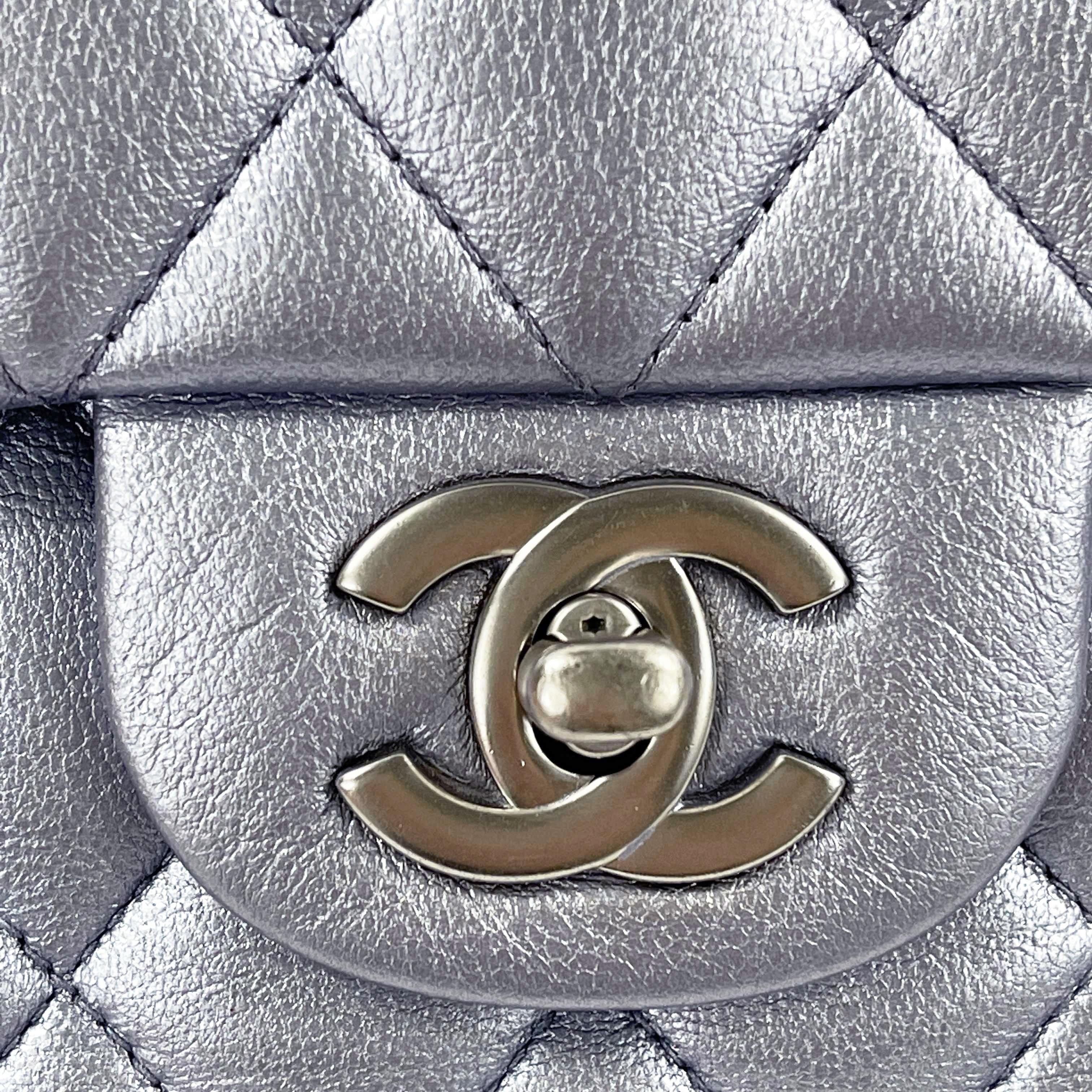 Close view of the CC clasp set into the diamond quilting