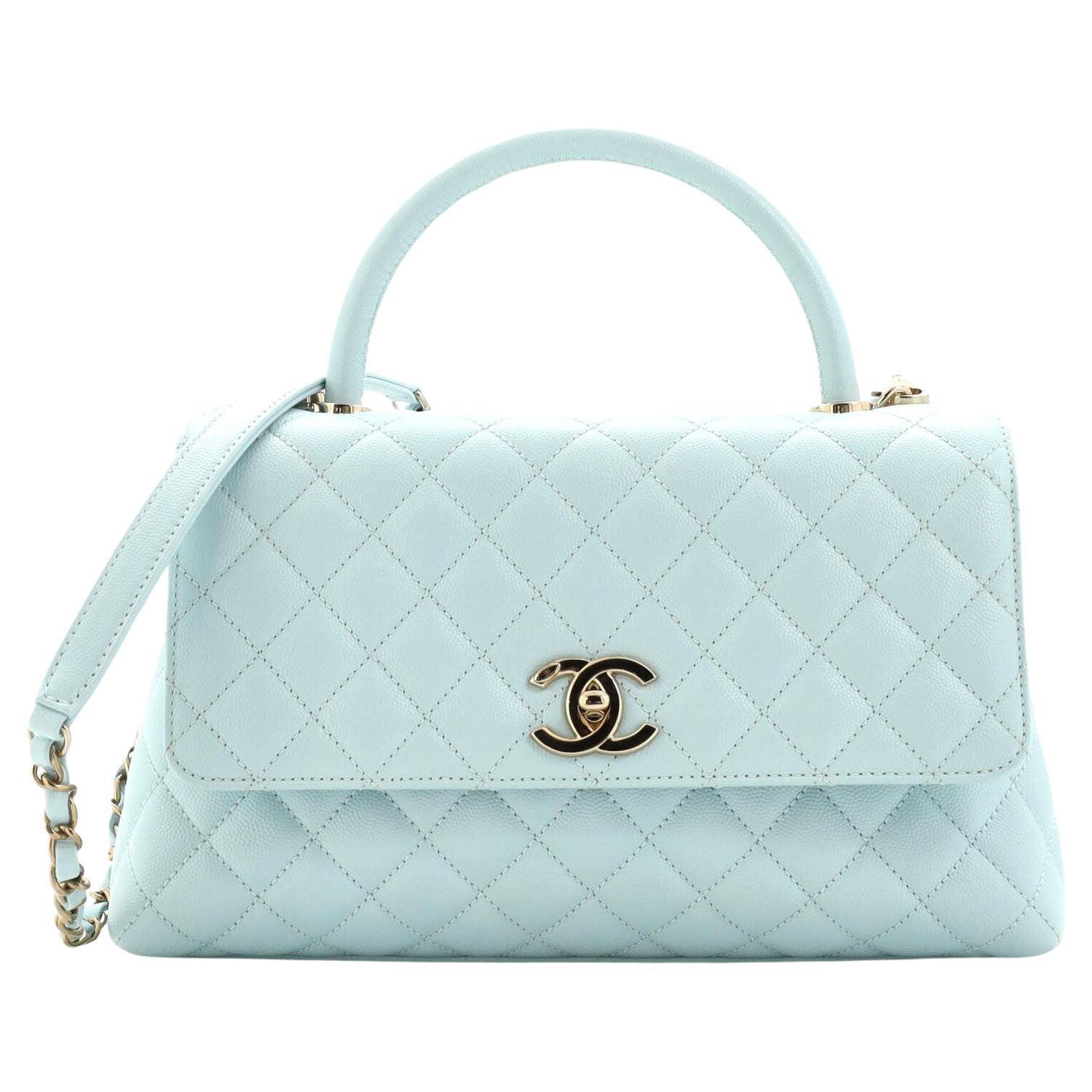 Pale blue caviar with gold hardware