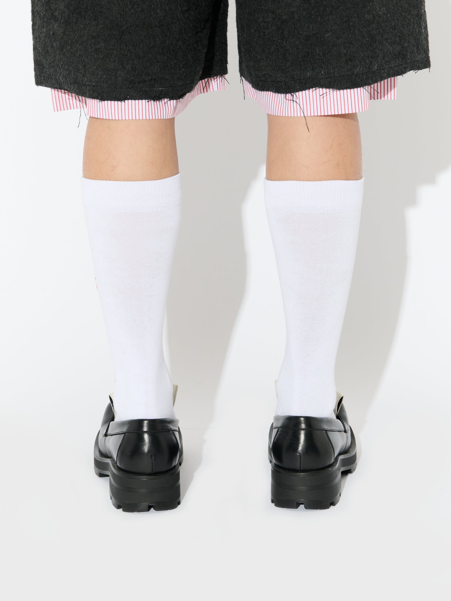 BANANA MOCCASIN MOGGIES in BLACK WHITE — alternate official view