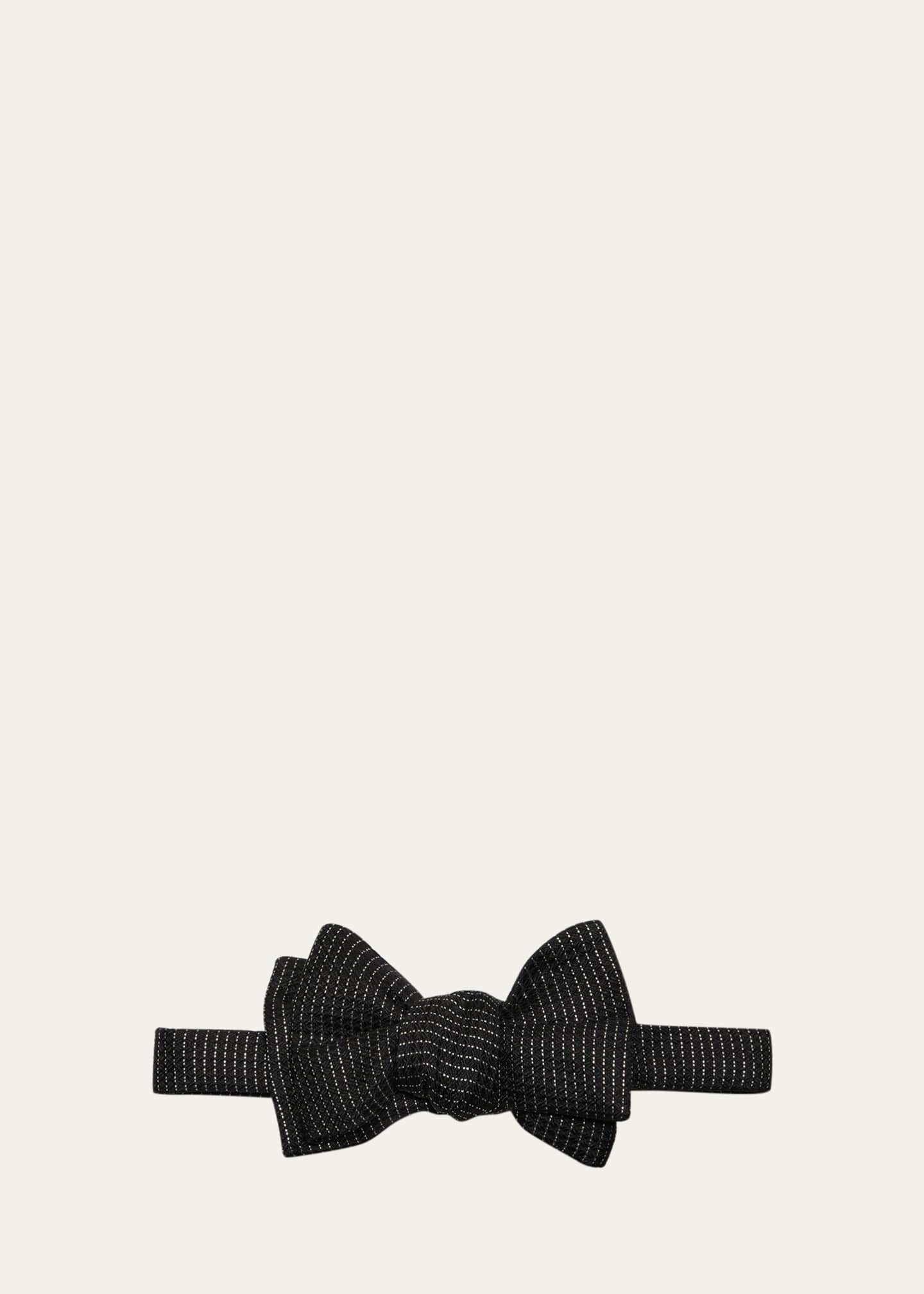 formal shirt worn with black bow tie